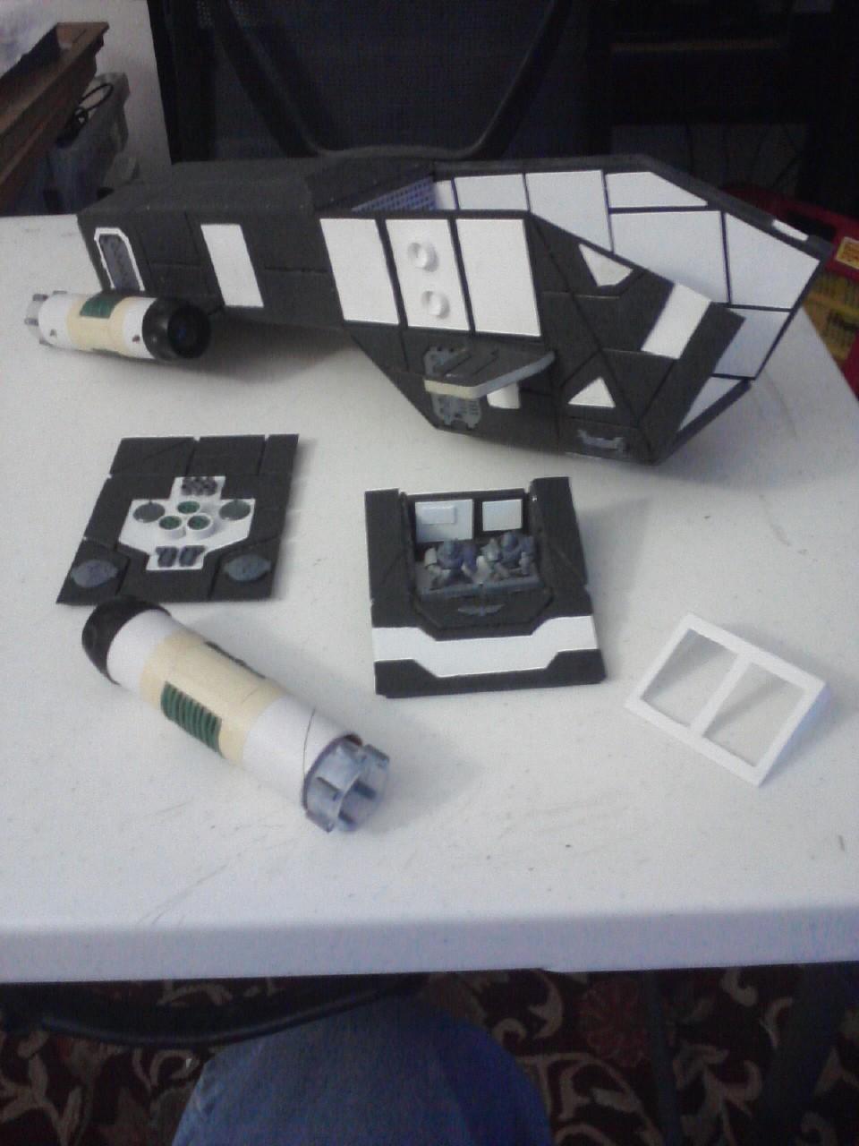 A collection of constructed parts for the Thunderhawk. (Engine, Top Panel, Cockpit)