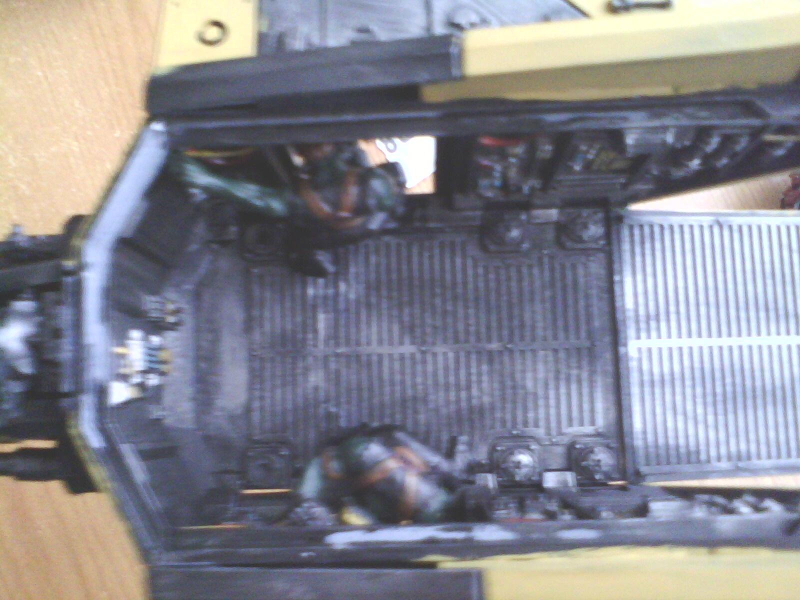 Interior, ork gunners holding on to body of valk