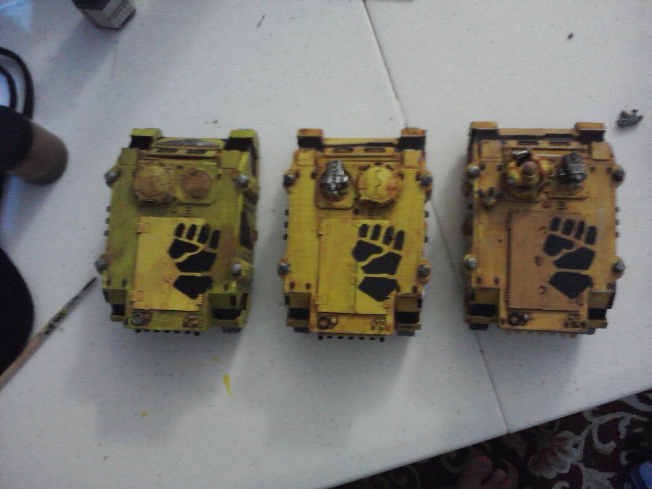 I was so happy with the insignia on the floor of the hold I decided to add it to three rhinos