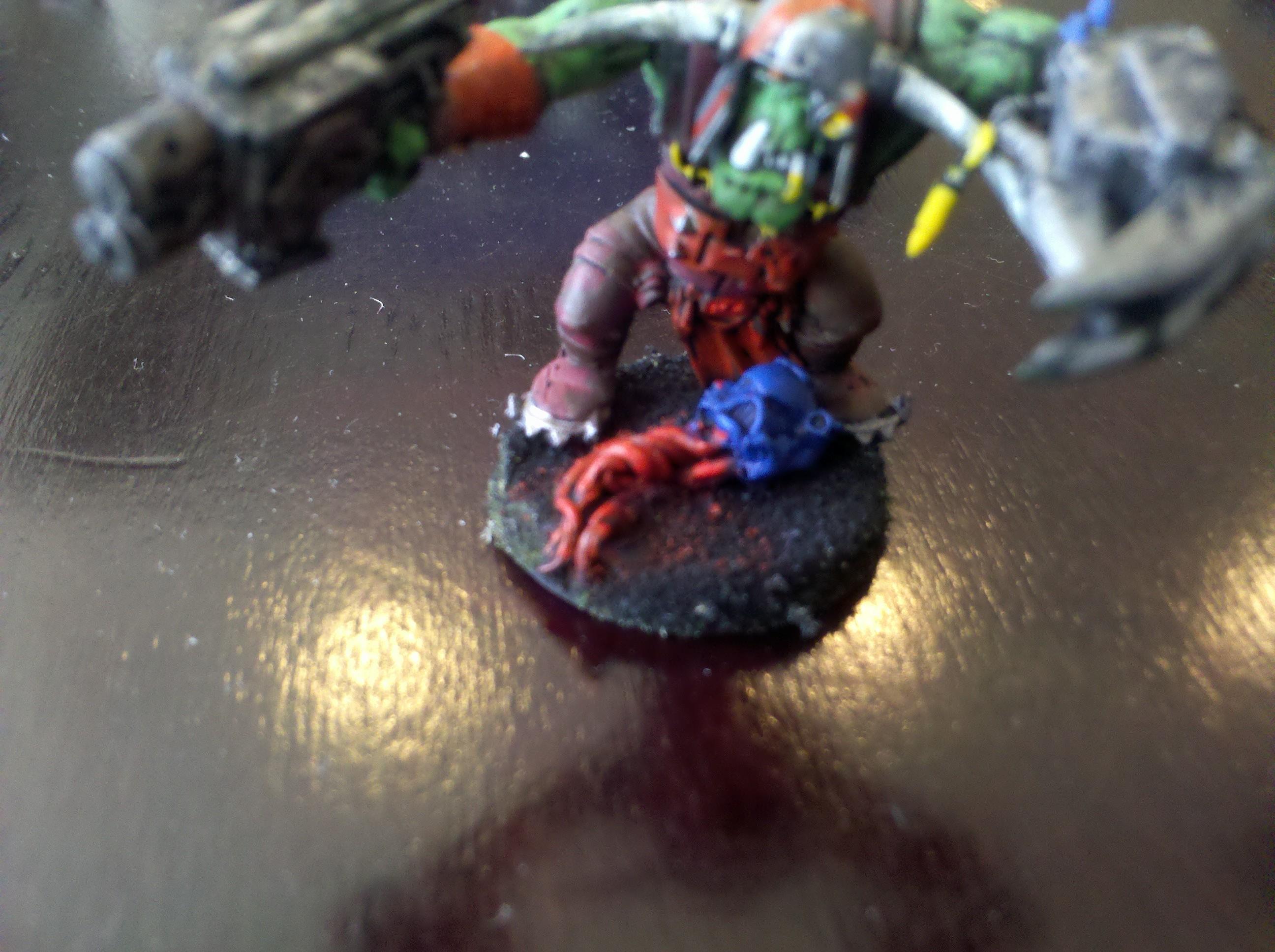 Orks, Marine Head with guts at Nob's Base