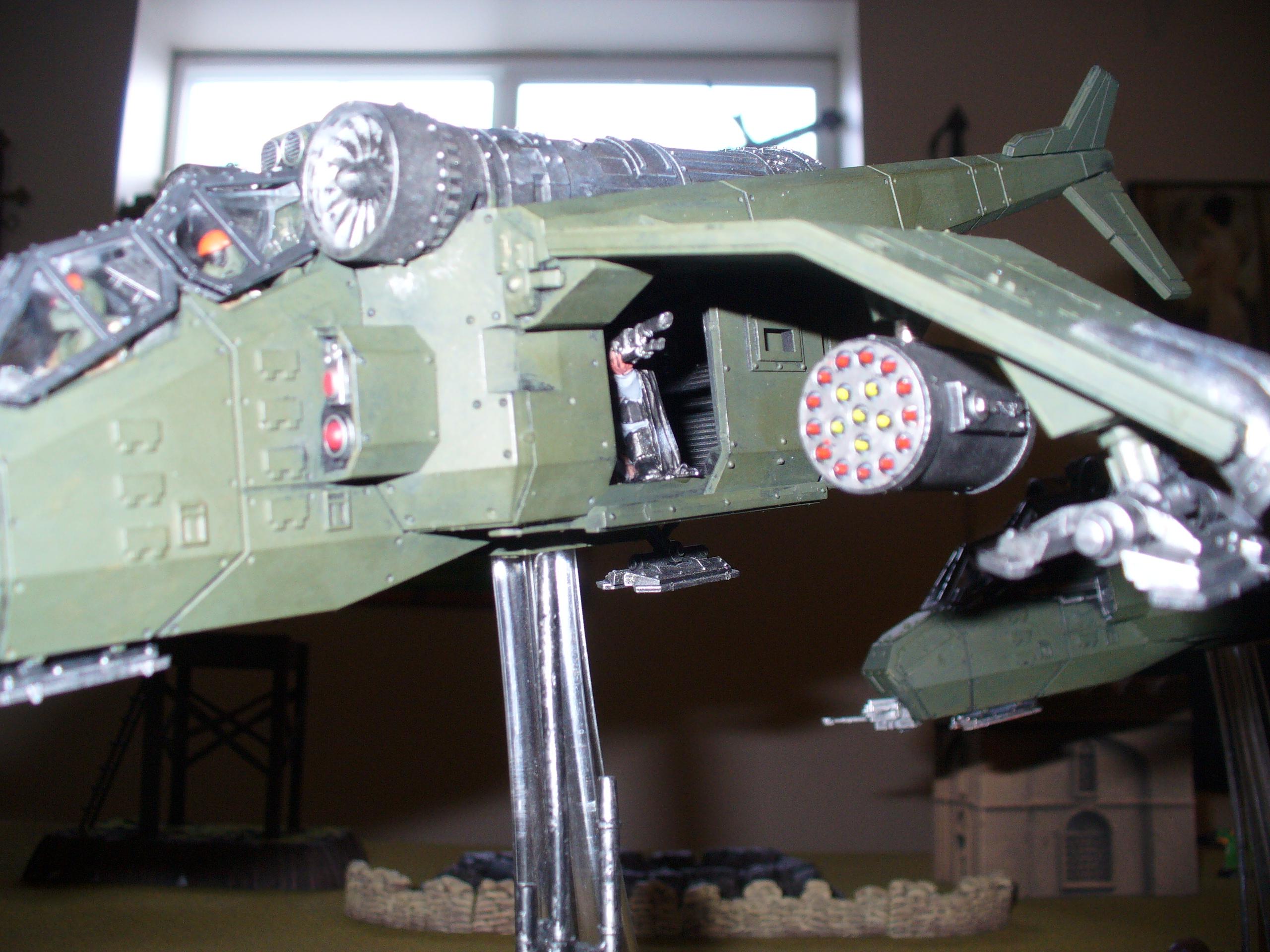 He is a little hard to see, but here is a sniper, urban camo, I used the crouching Cadian sniper model on this side