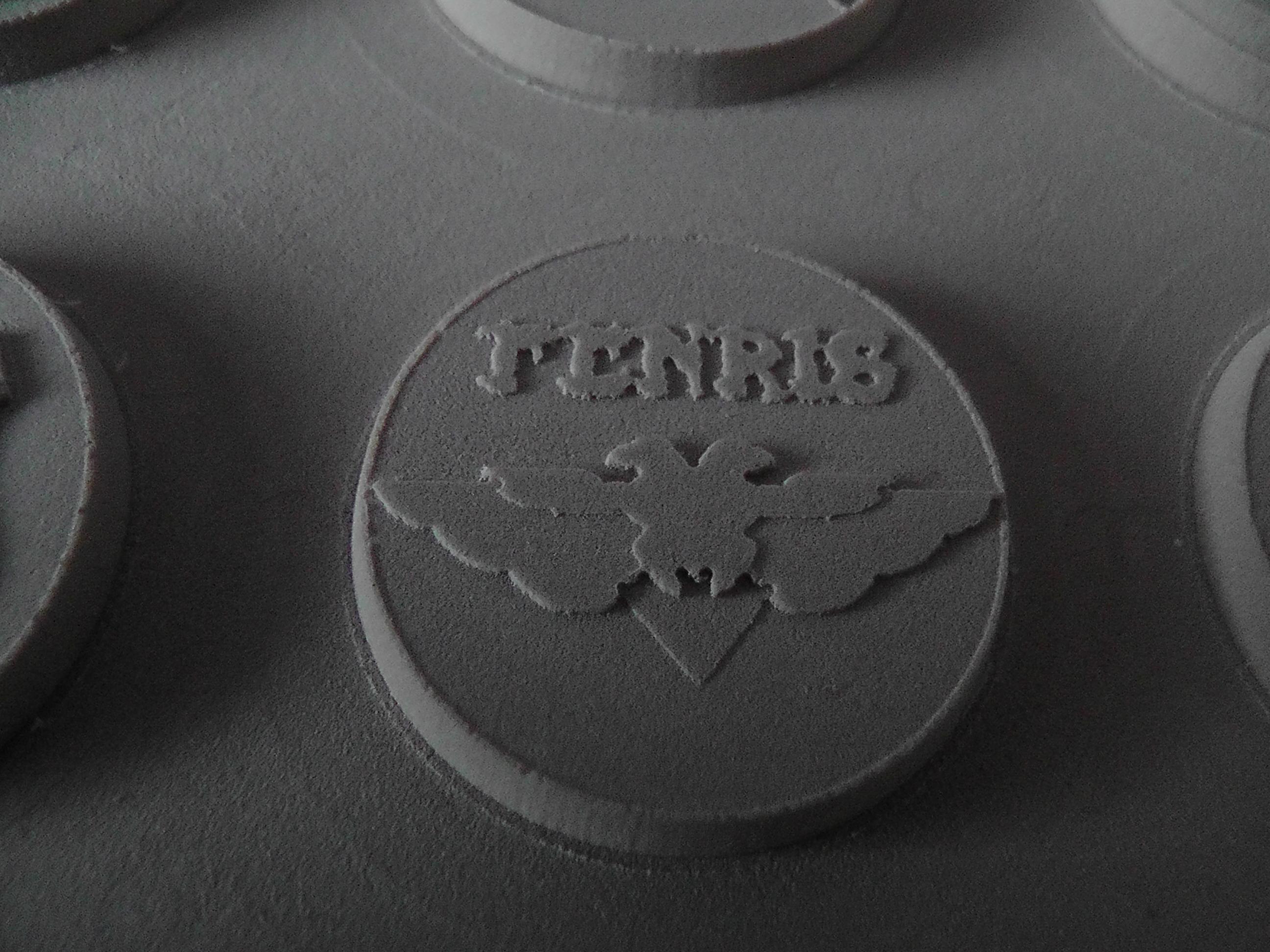 Big aquila with raised lettering. I just used the word Fenris from the wolf bases to save time