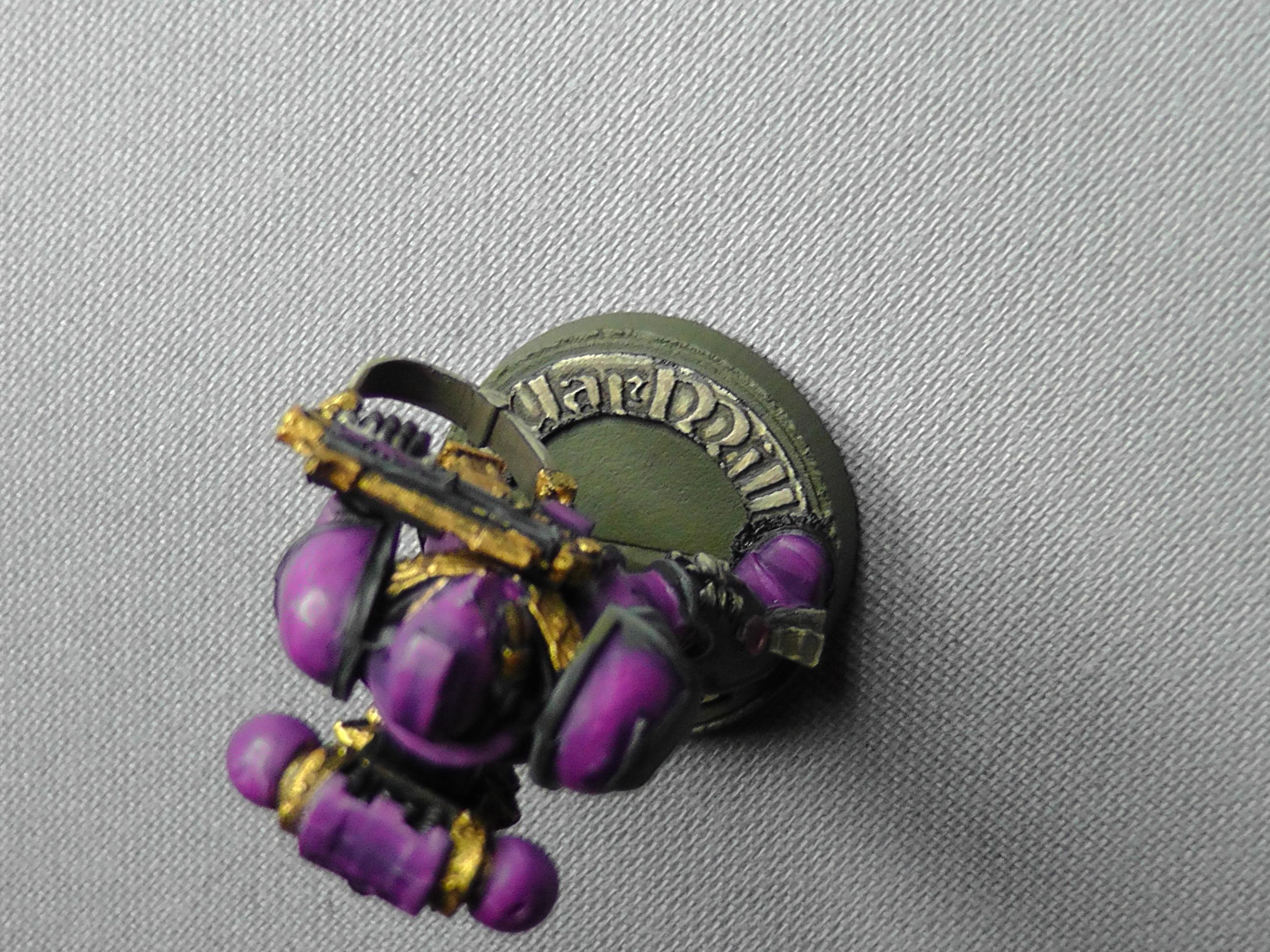 Oh yeah! Not sure how to finish the base yet, either flock or silver drybrush. I should have done that before painting the scroll and logo