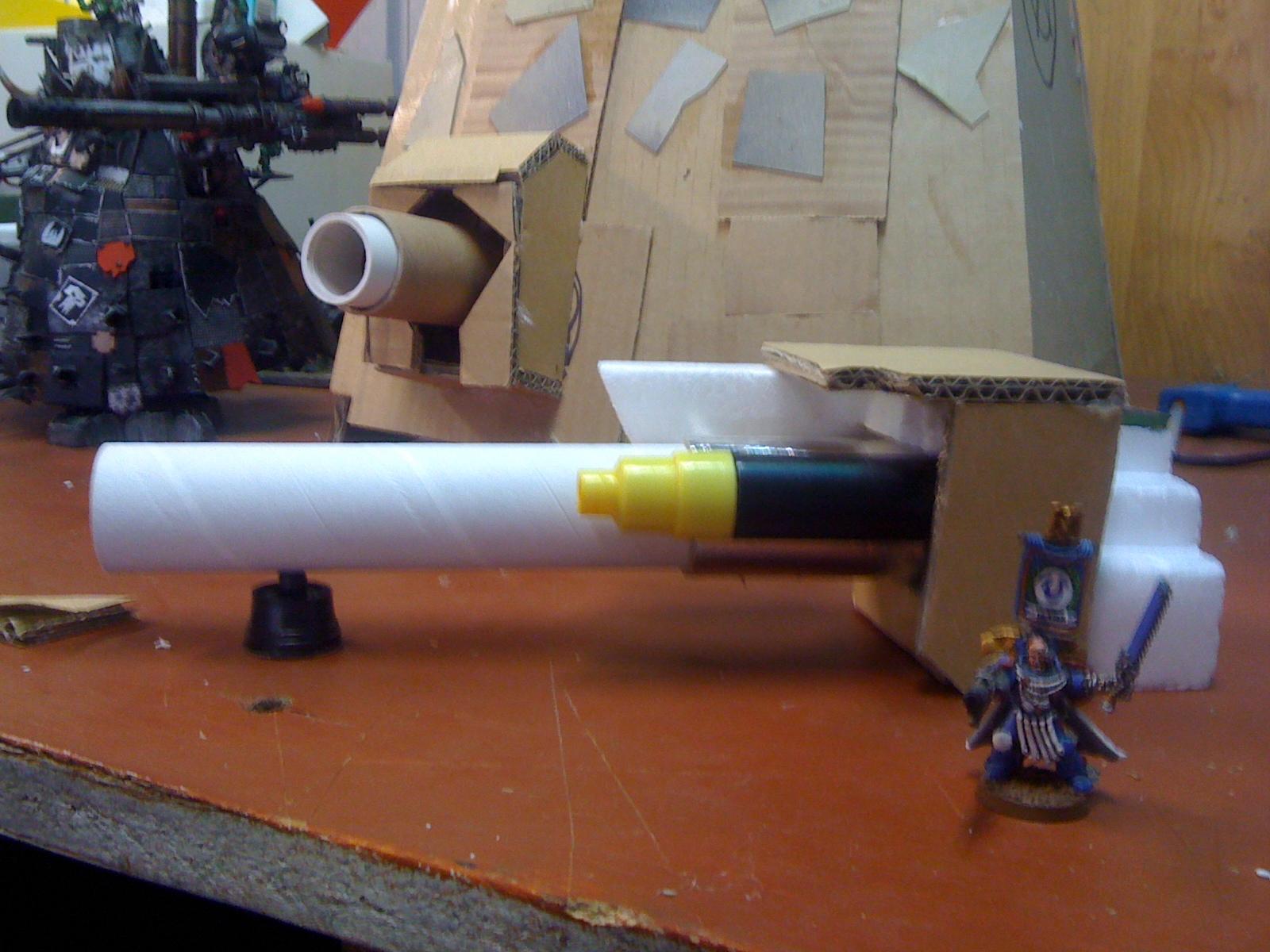 This is the gun arm alongside a Space Marine commander for scale, Belly gun off in the distance