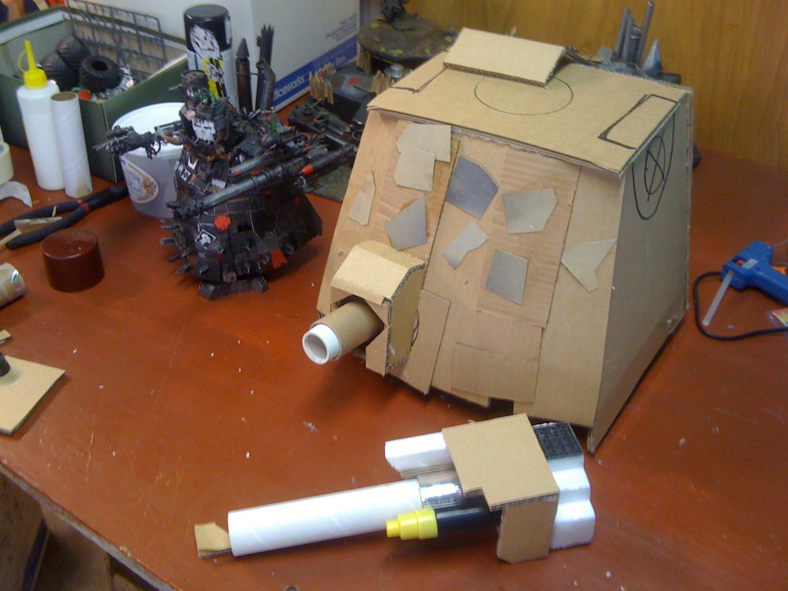 Belly gun with complete housing and the first stages of the gun arm in the foreground