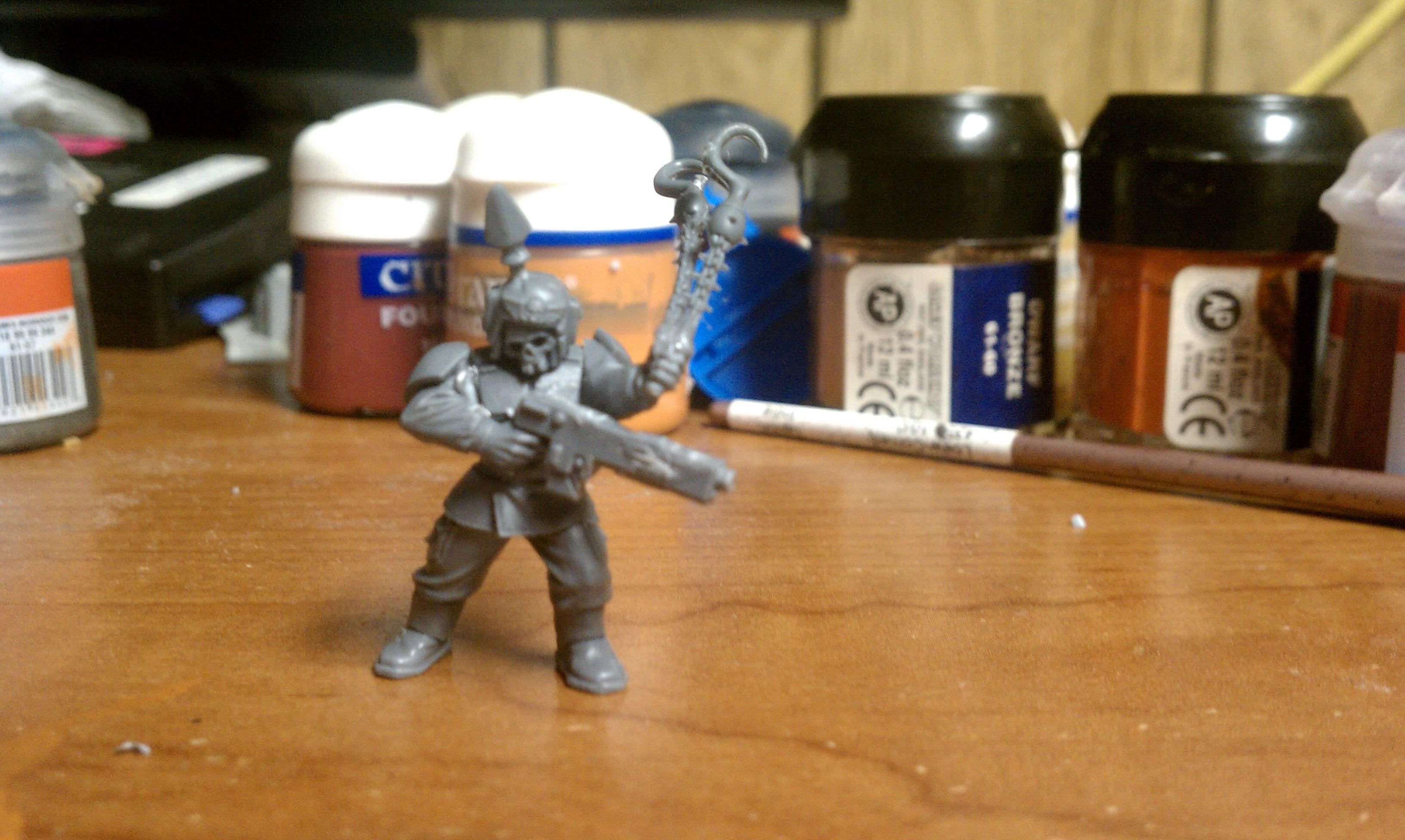 My custom enforcer inspired by the Forge world set and a lot of chaos pieces and exacto cutting went into this, but it is just my first one, i need 5 for my command squad