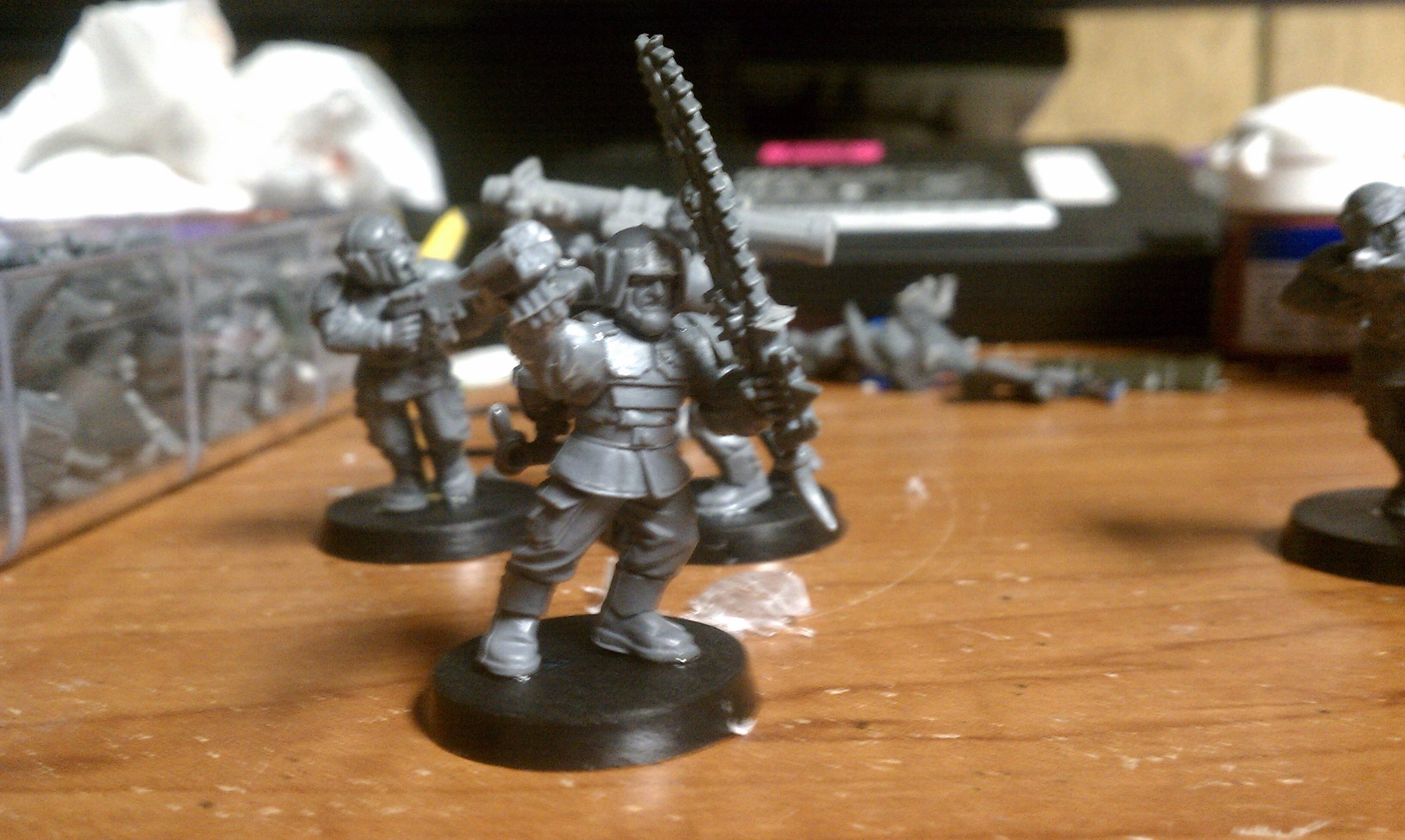 Helios Hellfire Warrior, wrist mounted flamer and a chain sword, the chaos champion for my squads