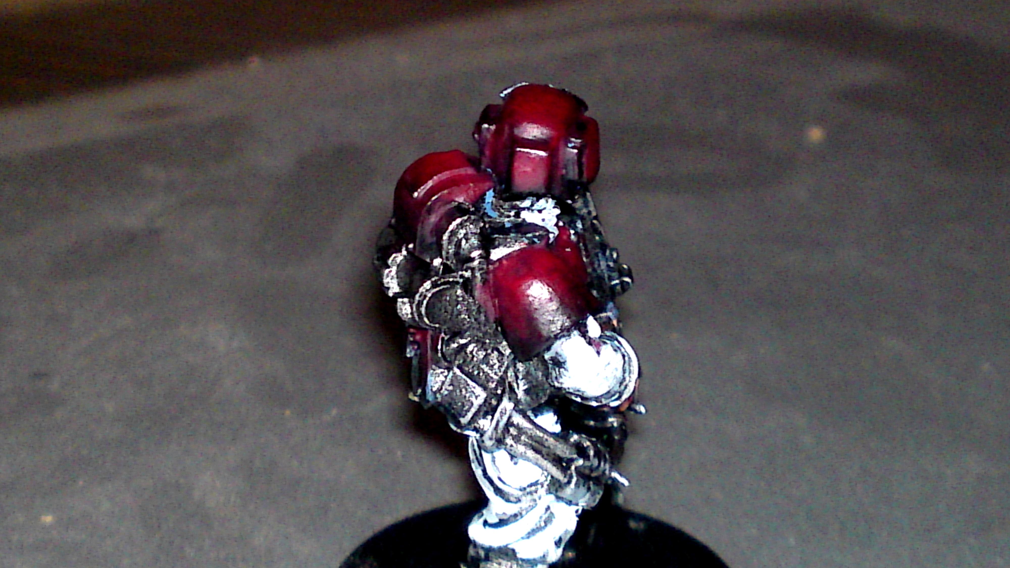 Feathering on his armour