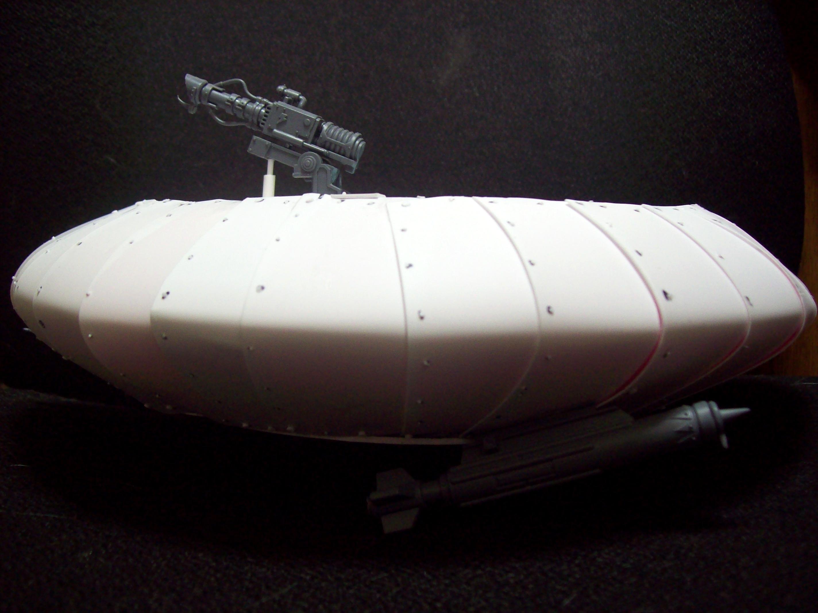 Saucer side with gun