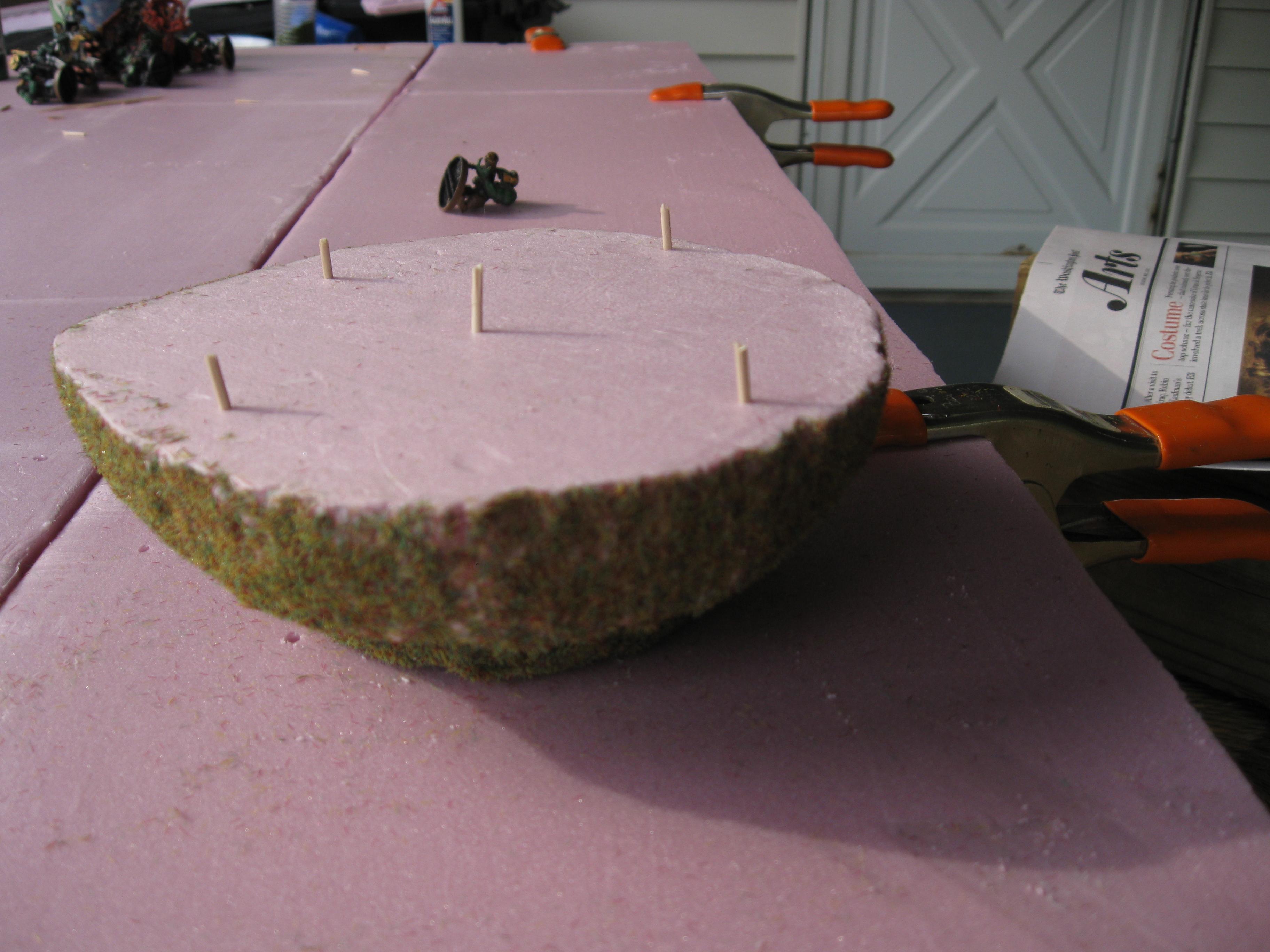 Hills were made with polystyrene. toothpick were used to hold them in place. i didn't use glue so i can take them off when not in use