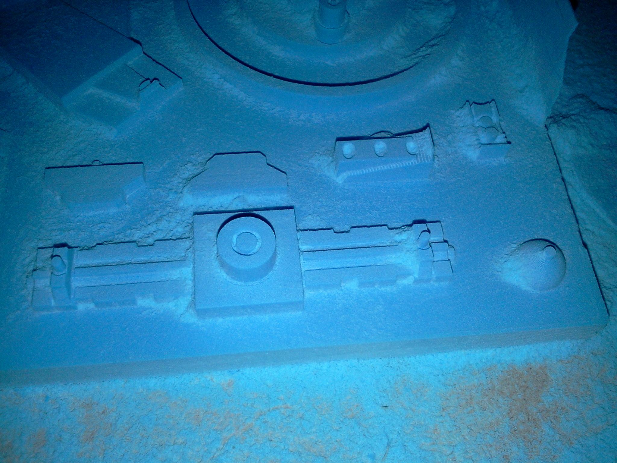 One side of the fan support and the exhaust vent