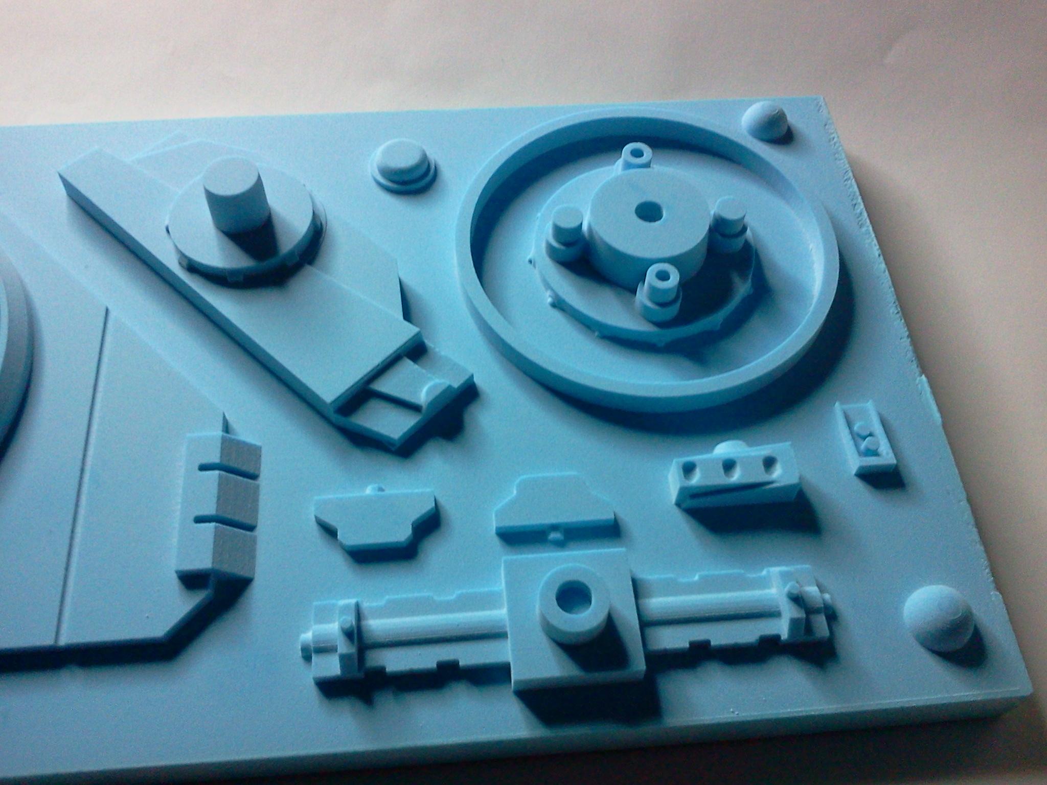 The fan axle and supports, along with the main rotor bearing. The axle lets the fan pivot within the wing