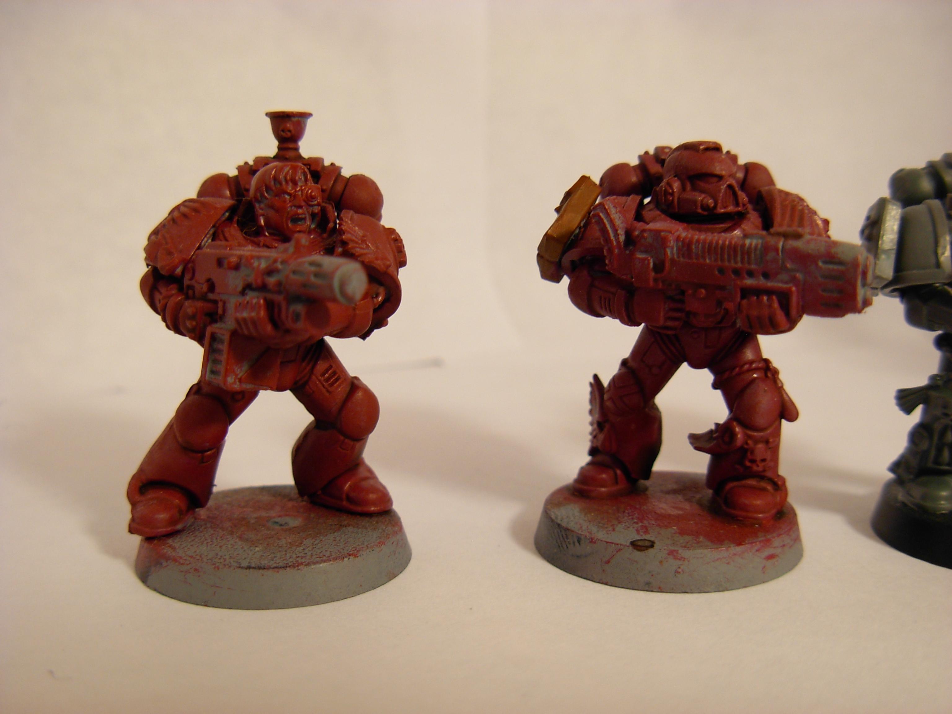 2 more marine, combi melta and Plasma, dont let the red fool you they can be any other color 