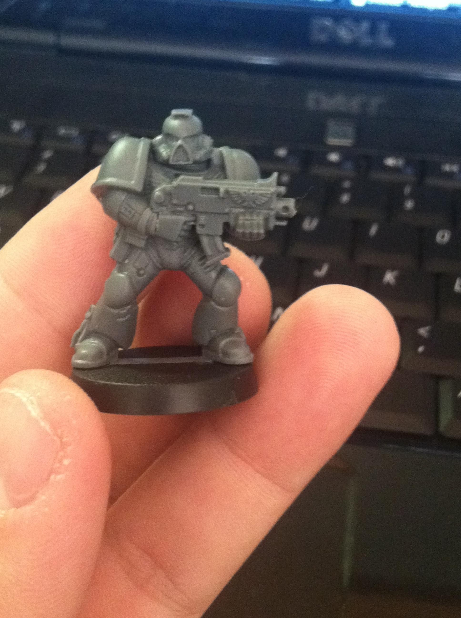 A marine from the box of 3. Not poseable? We'll see
