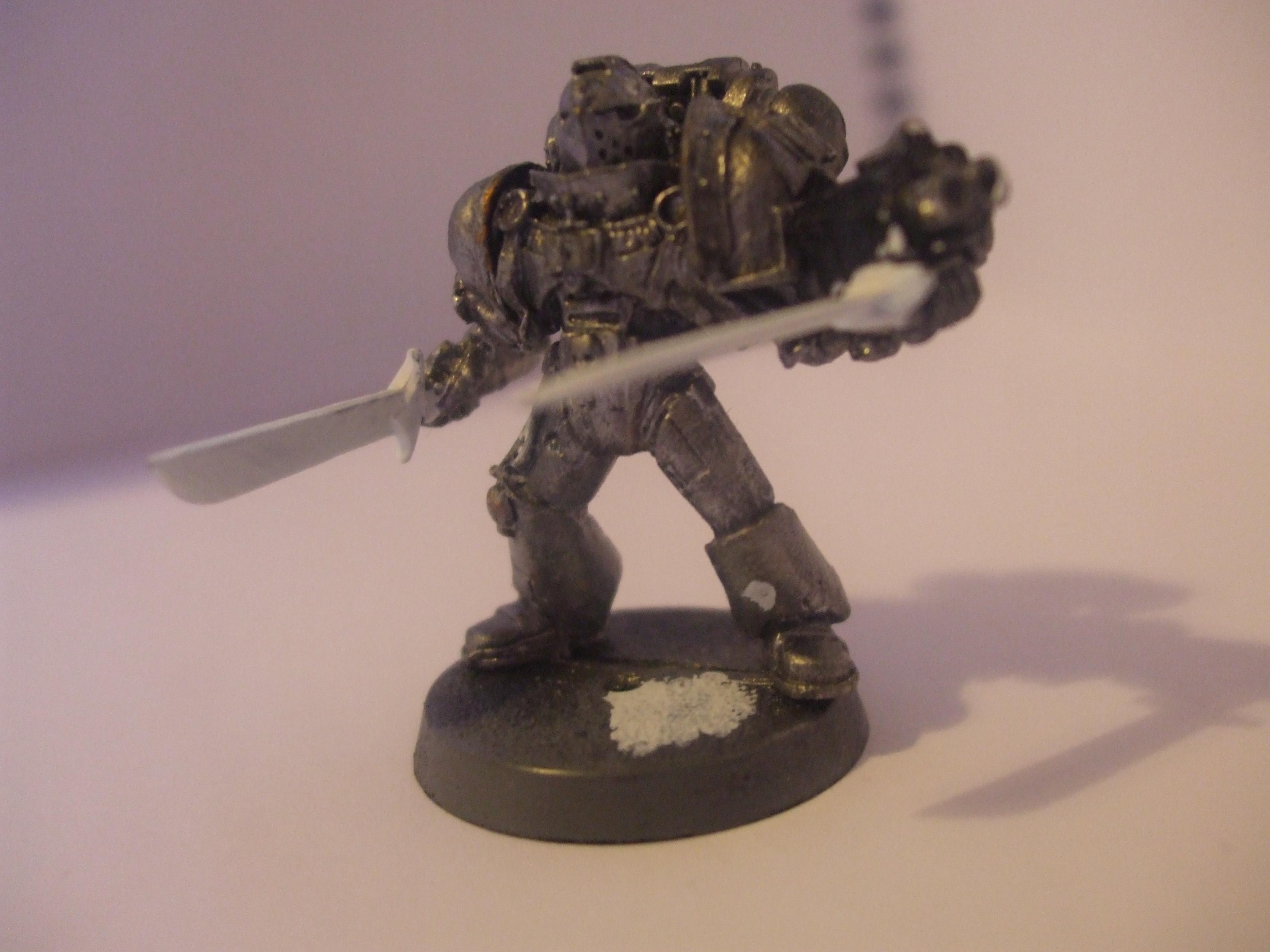 the second guy with falchions is the grey knight that seems stunned