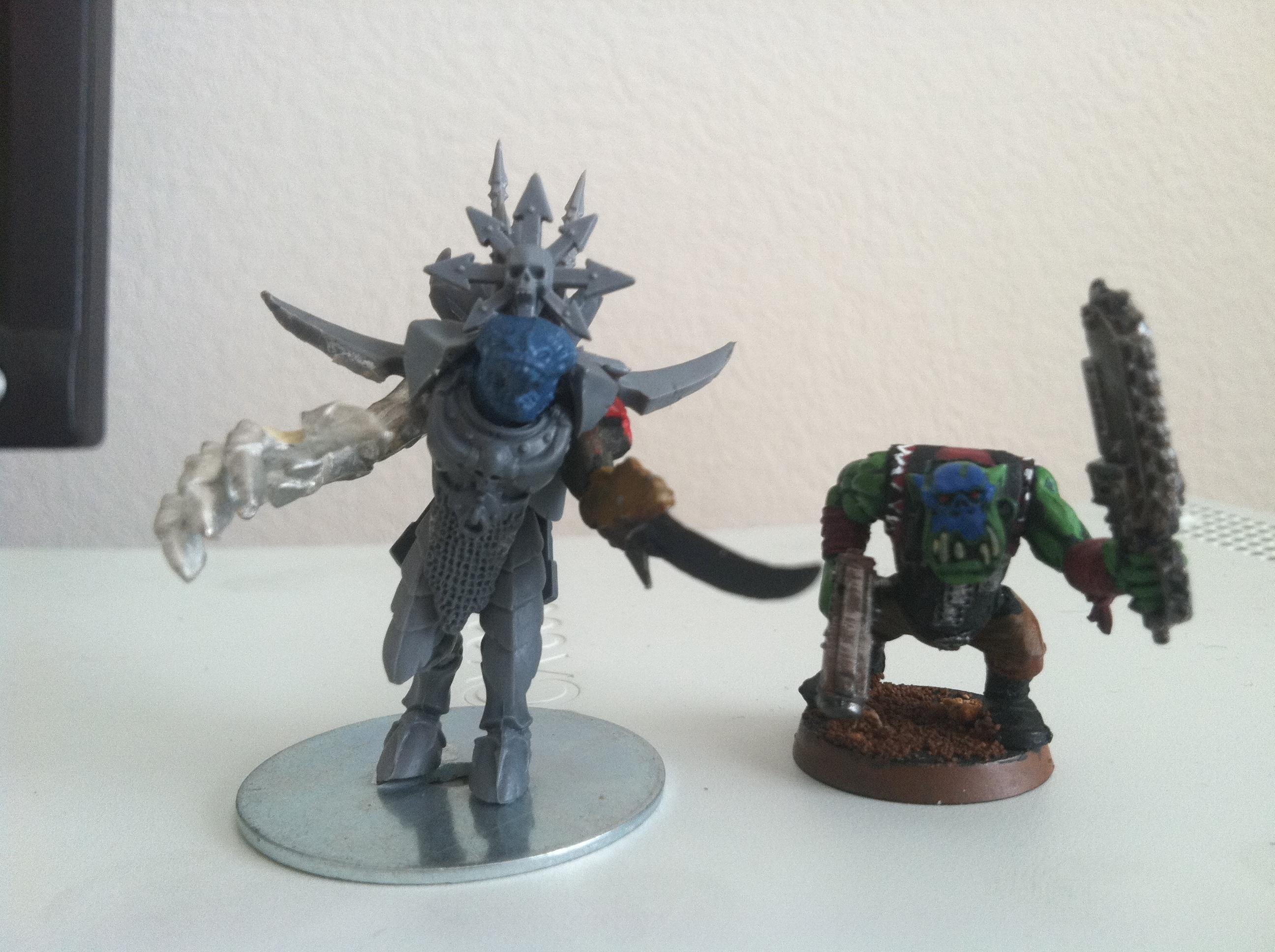This is what I came up with, next to an Ork for scale