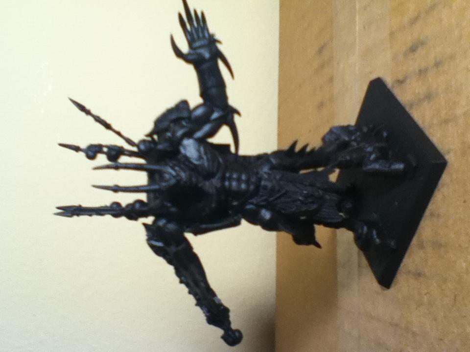 Raptor Daemon Prince made with leftover bits from a Daemon Prince kit and Predator sponson as the jump pack. 