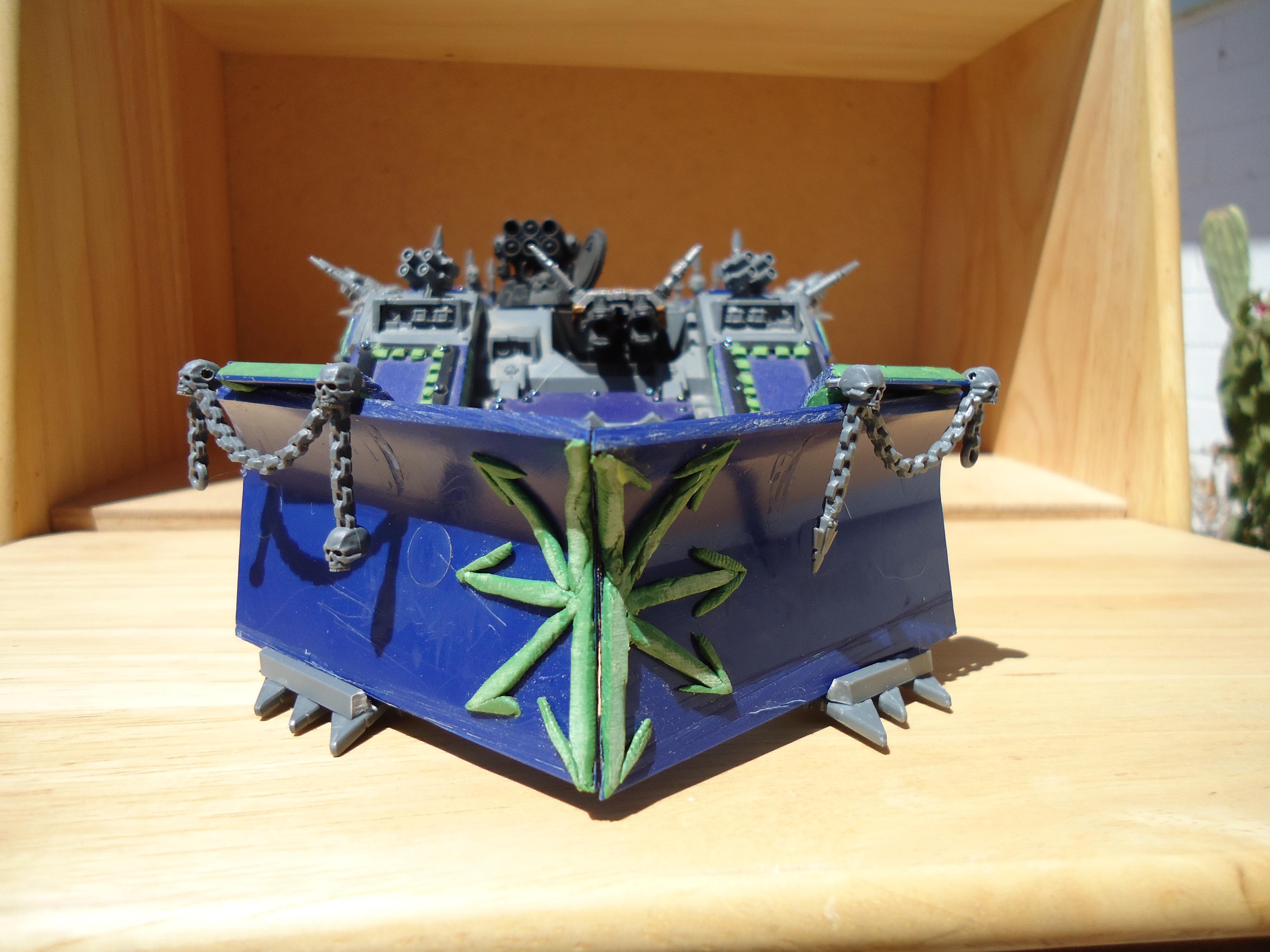 shot of the dozer blade in the closed position. I have more greenstuff work to do to it, such as finishing the chaos star... and one side of it is a little loose. 