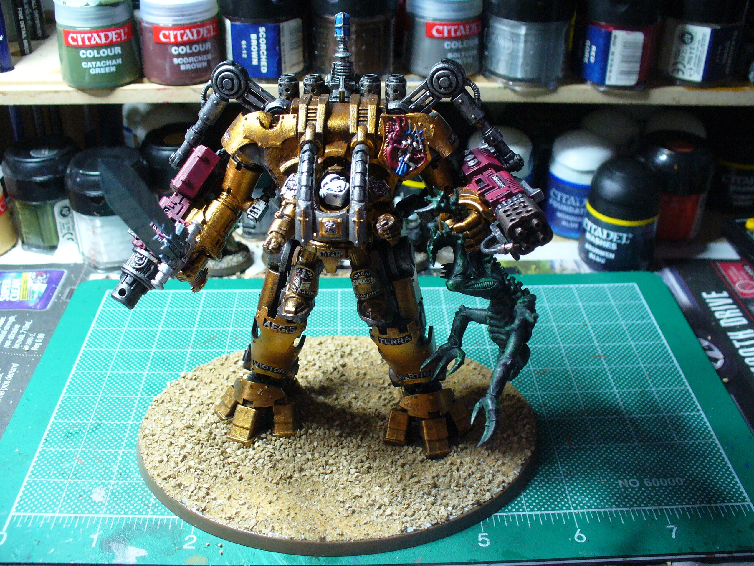 Nemesis Dreadknight holding a genestealer upside down