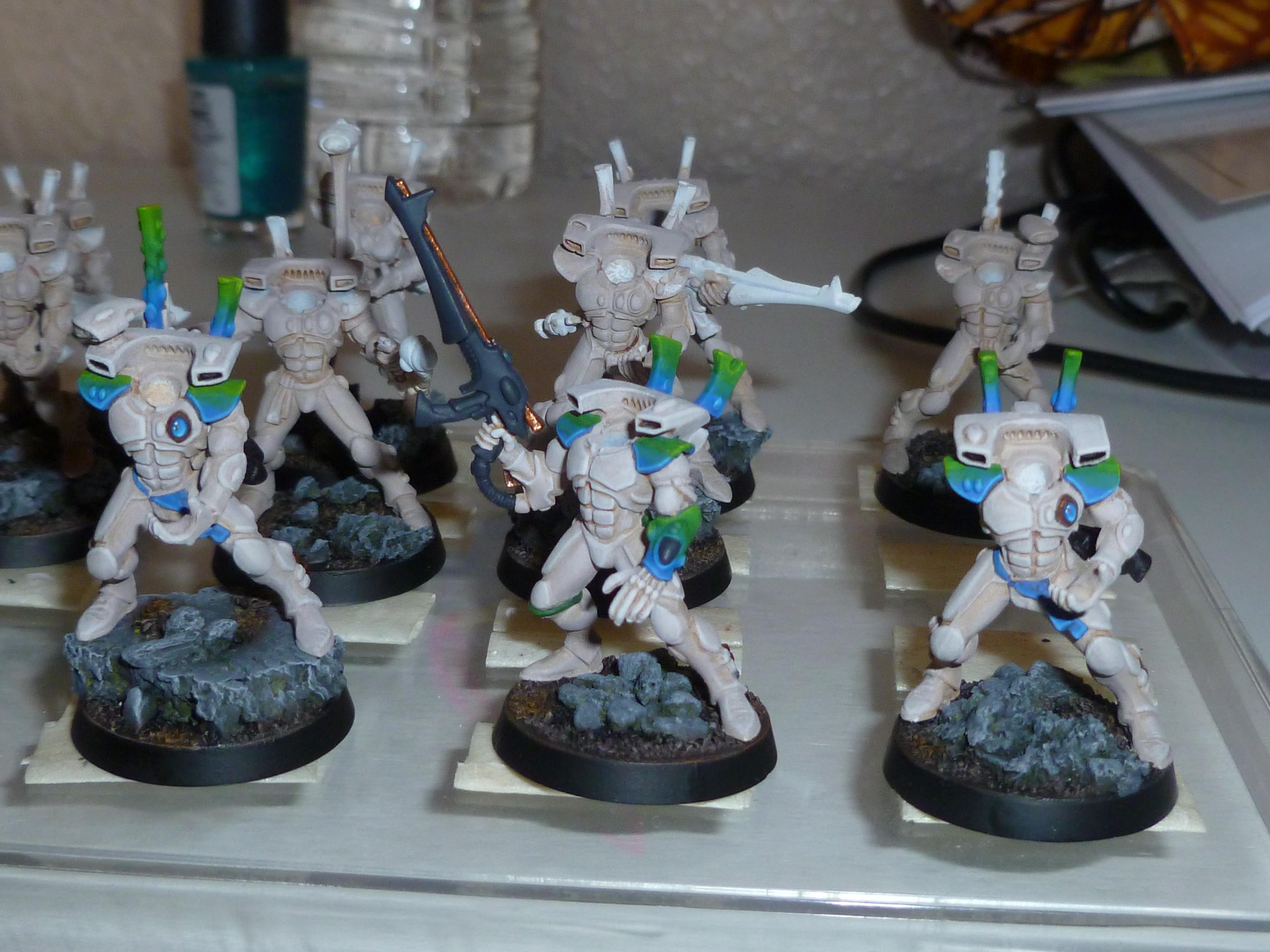 The helmets will eventually be a blended blue/green medley as well