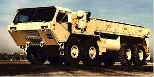 M977