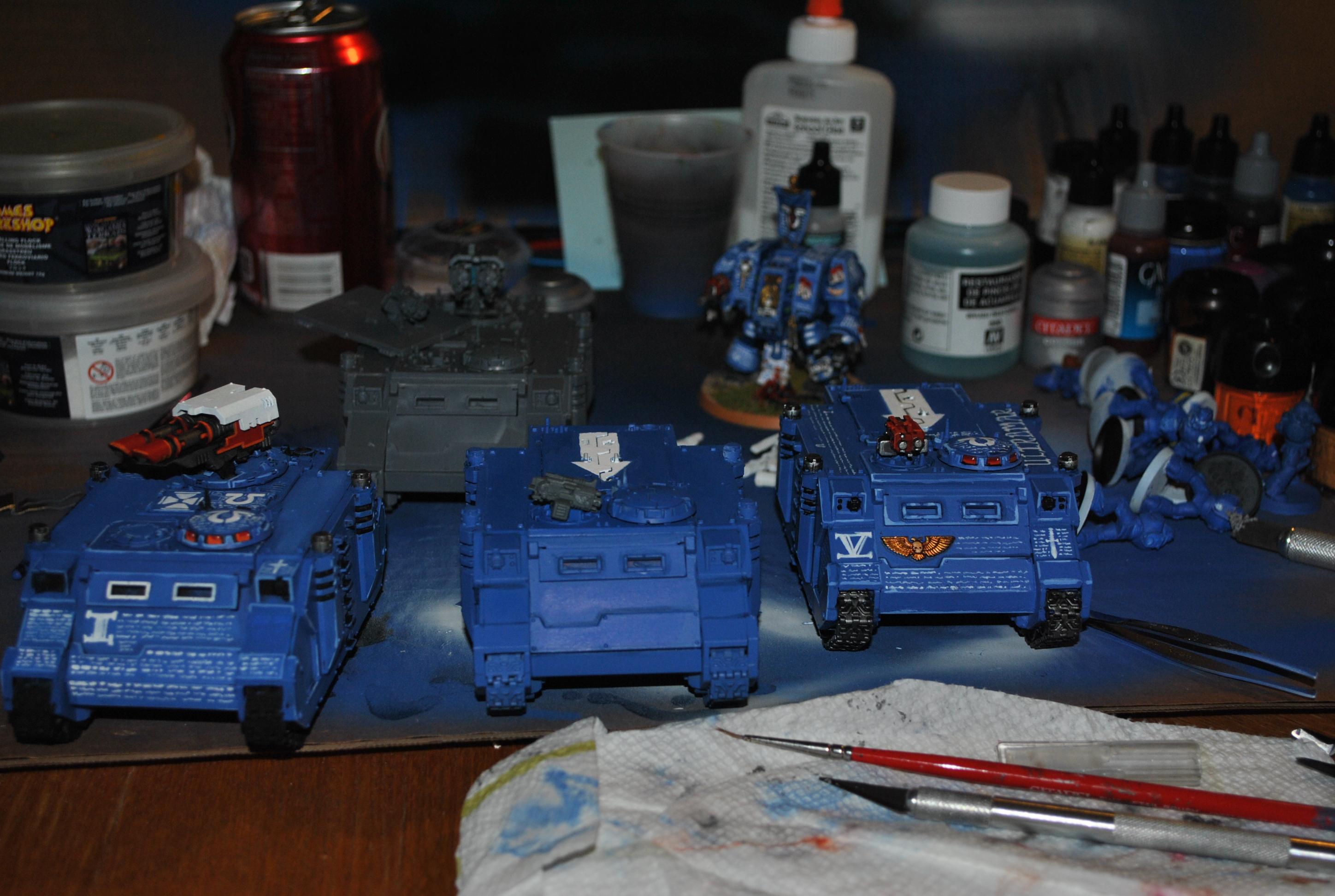 my current armored column. i will be adding 2 more rhinos, one razorback and a dakka predator