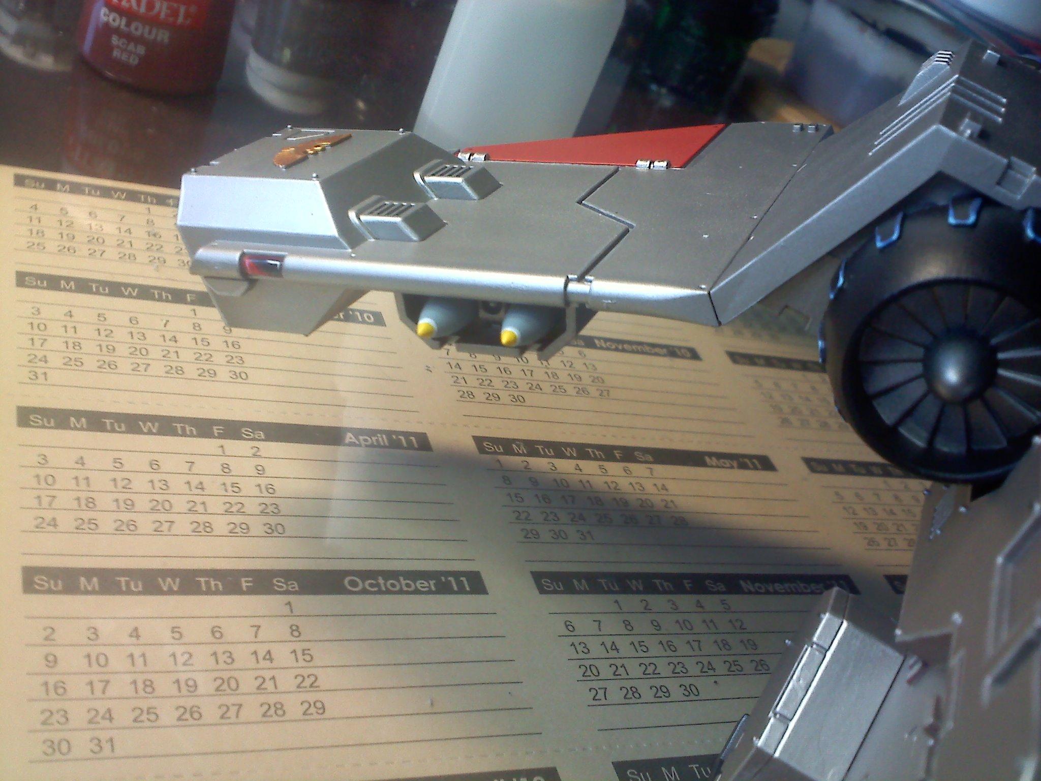 Painted the Eagles gold, the Missles are Primer Grey with a Skull White Ring, and a Yellow tip. I also painted the Left and Right warning lights on the wing tips