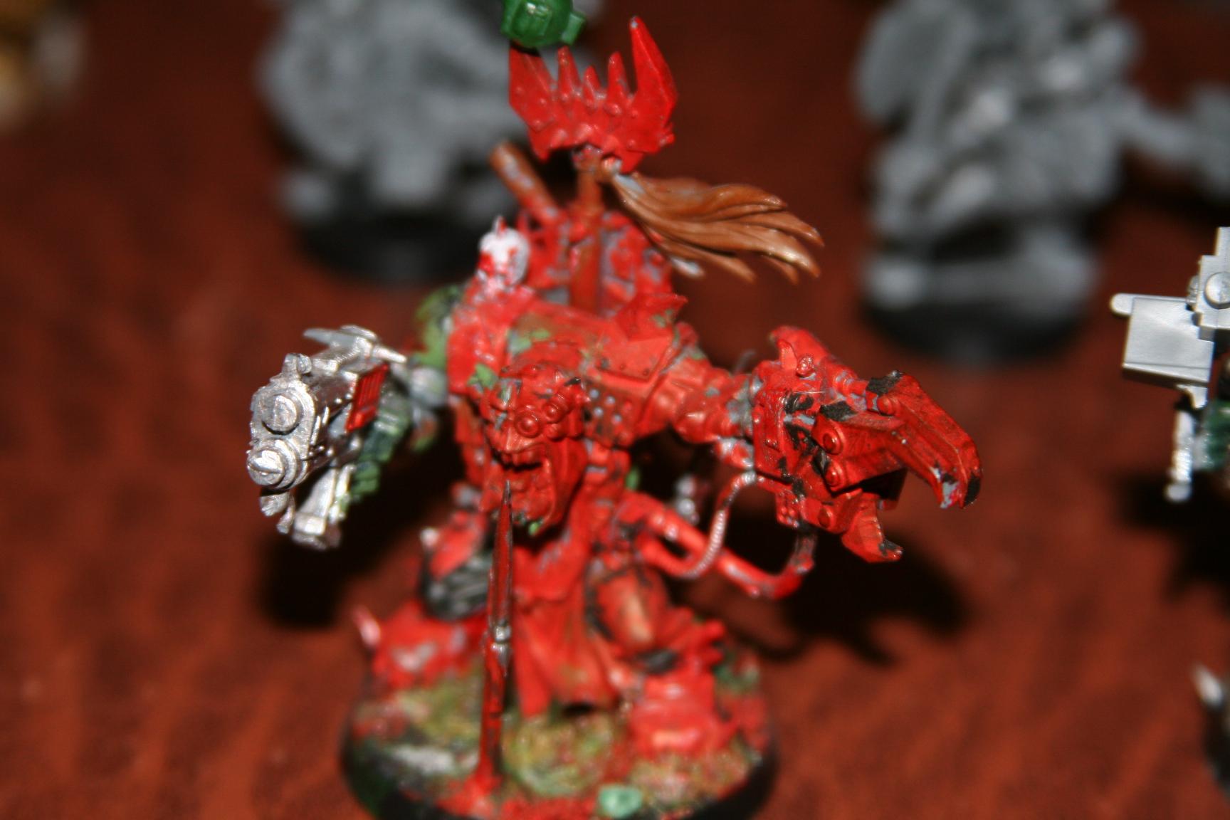 Old Warboss I had converted for a halloween at GW.  Needs some work..