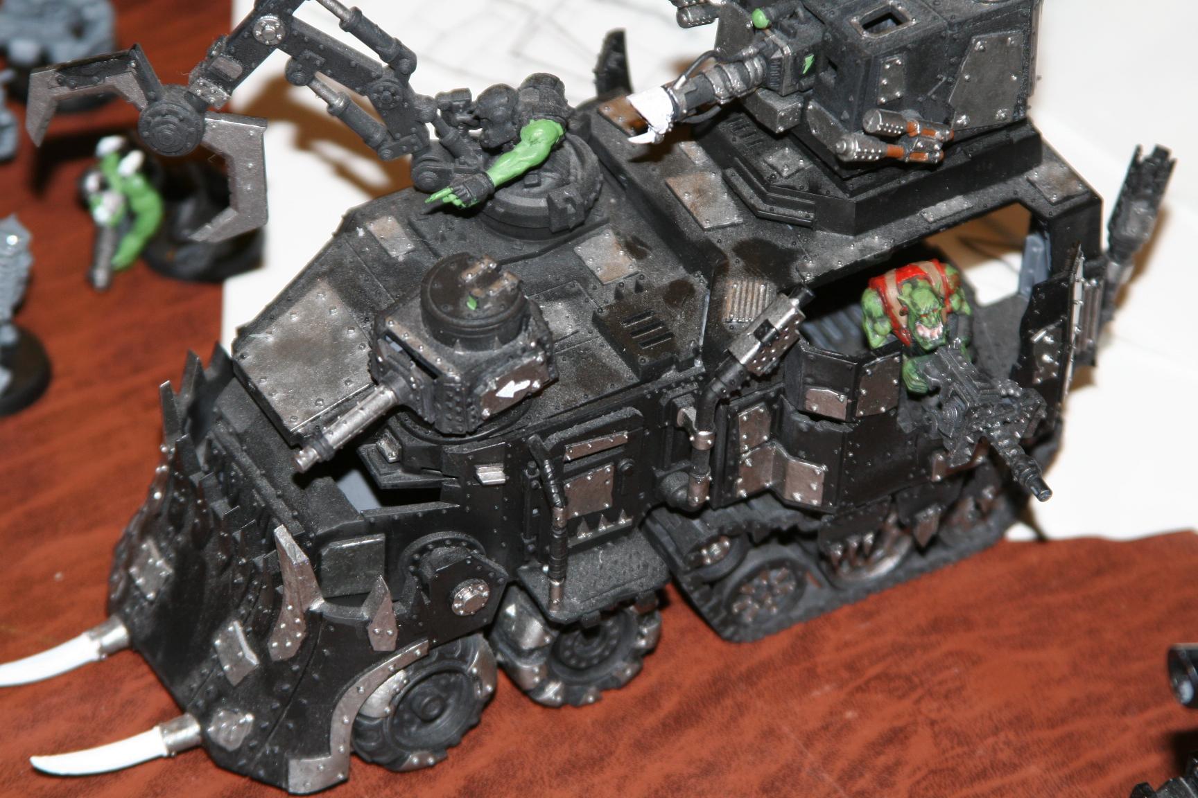 My friend's (former) Battlewagon.  I painted that gunner on the side