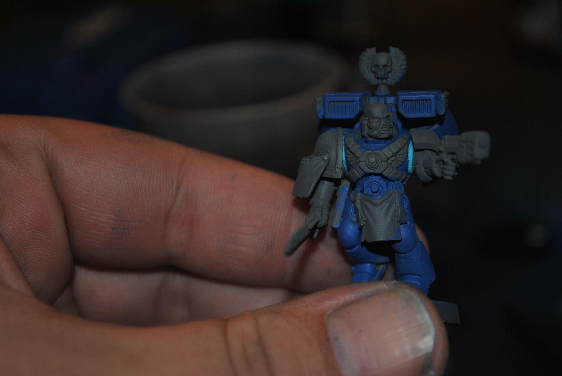 here is the seargent for the squad. the bits on the sides of his pack are wings