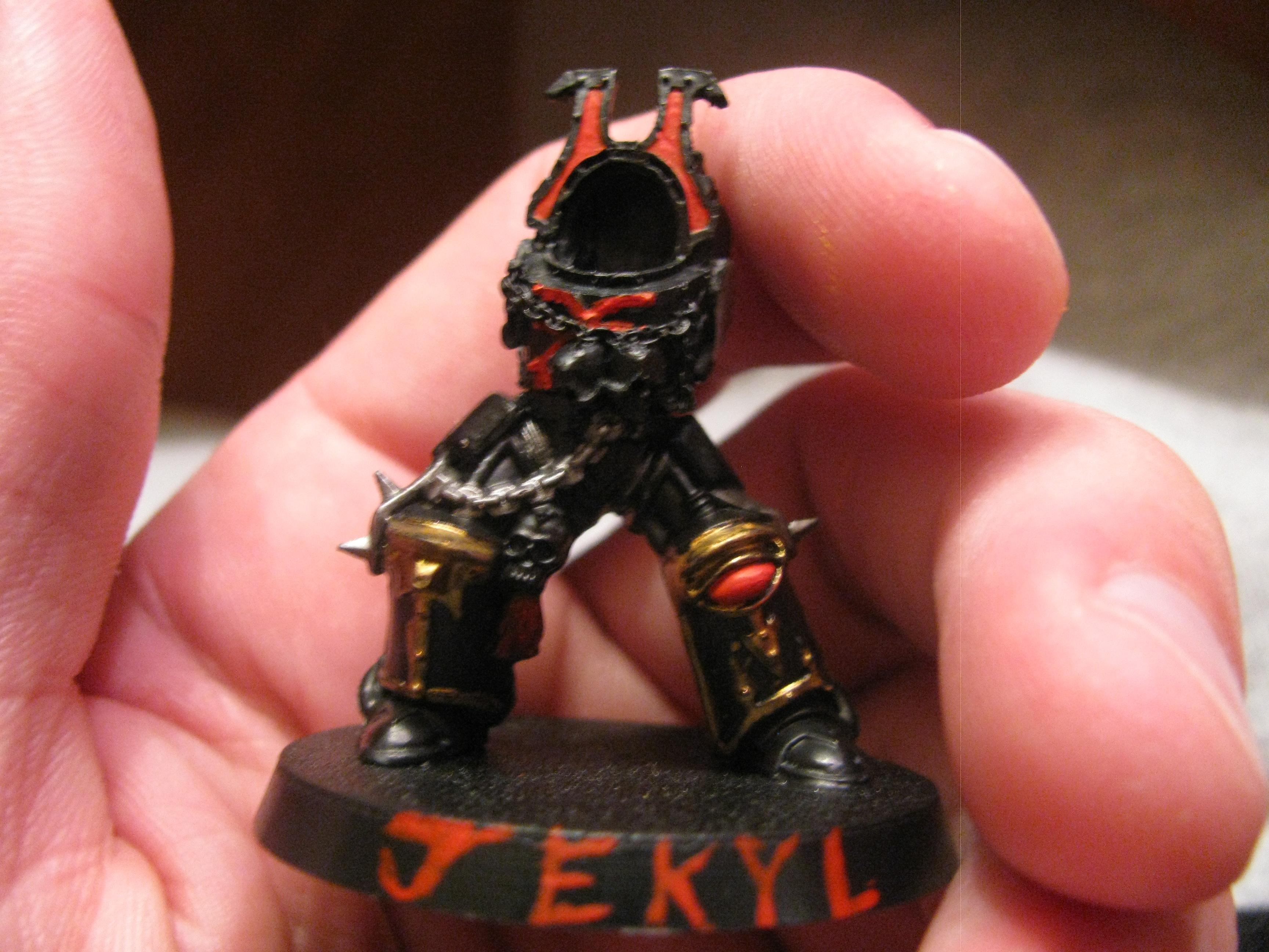 Jekyl, the warband's chief apothecary, wearing termie plate for a change