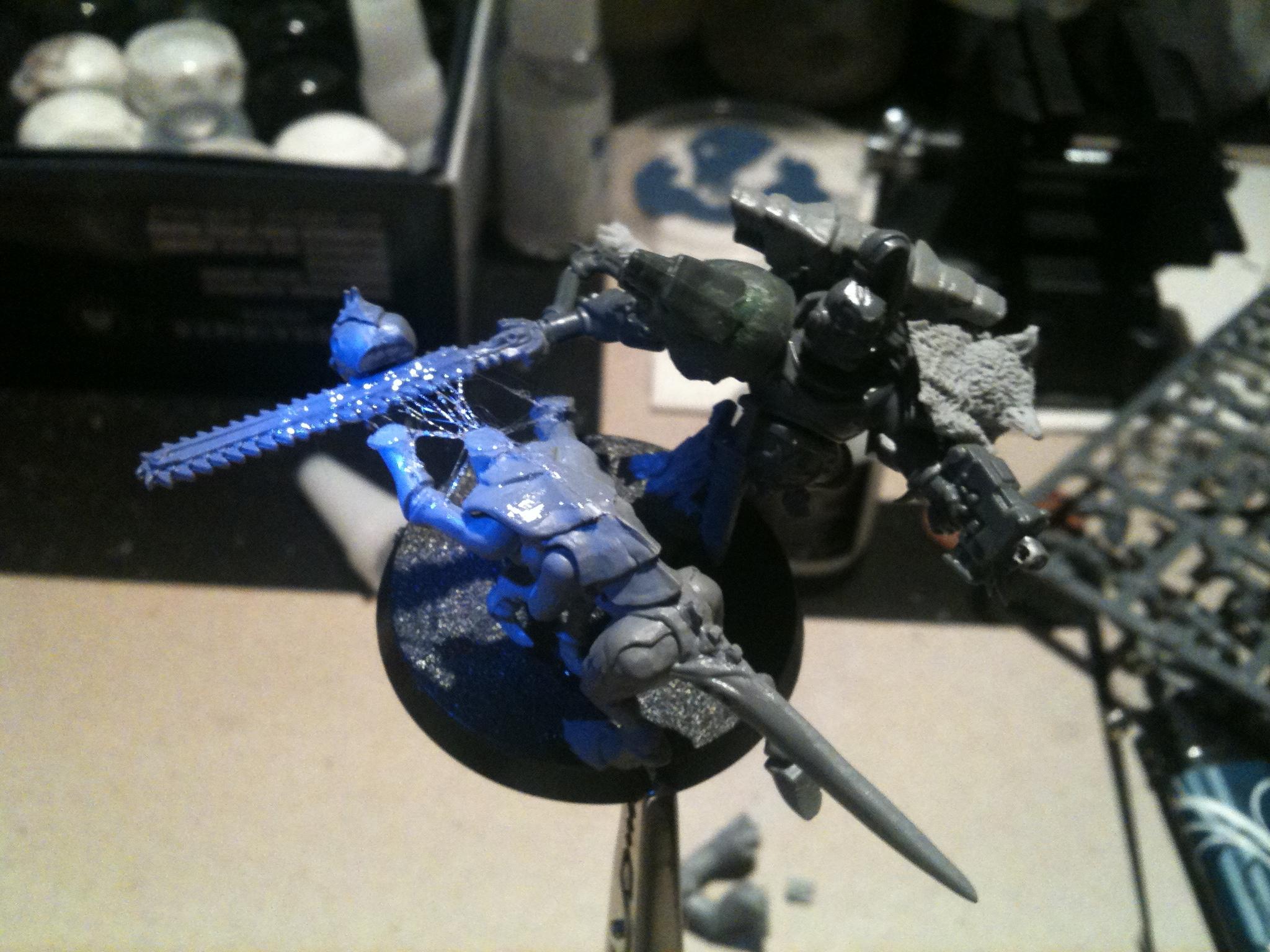 So added the tyranid in, chopped off his head and arms and added some gore to add to the decapitation scene.  I feel like this worked really well toward giving the model movement