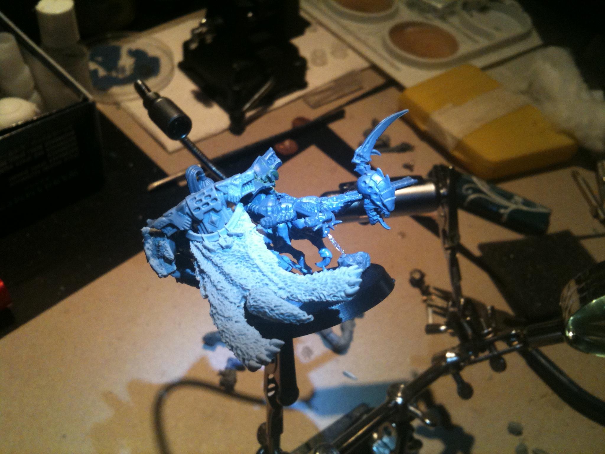 Shot of the backside, can see the decapitated tyranid head as it is carried forward by the sword momentum