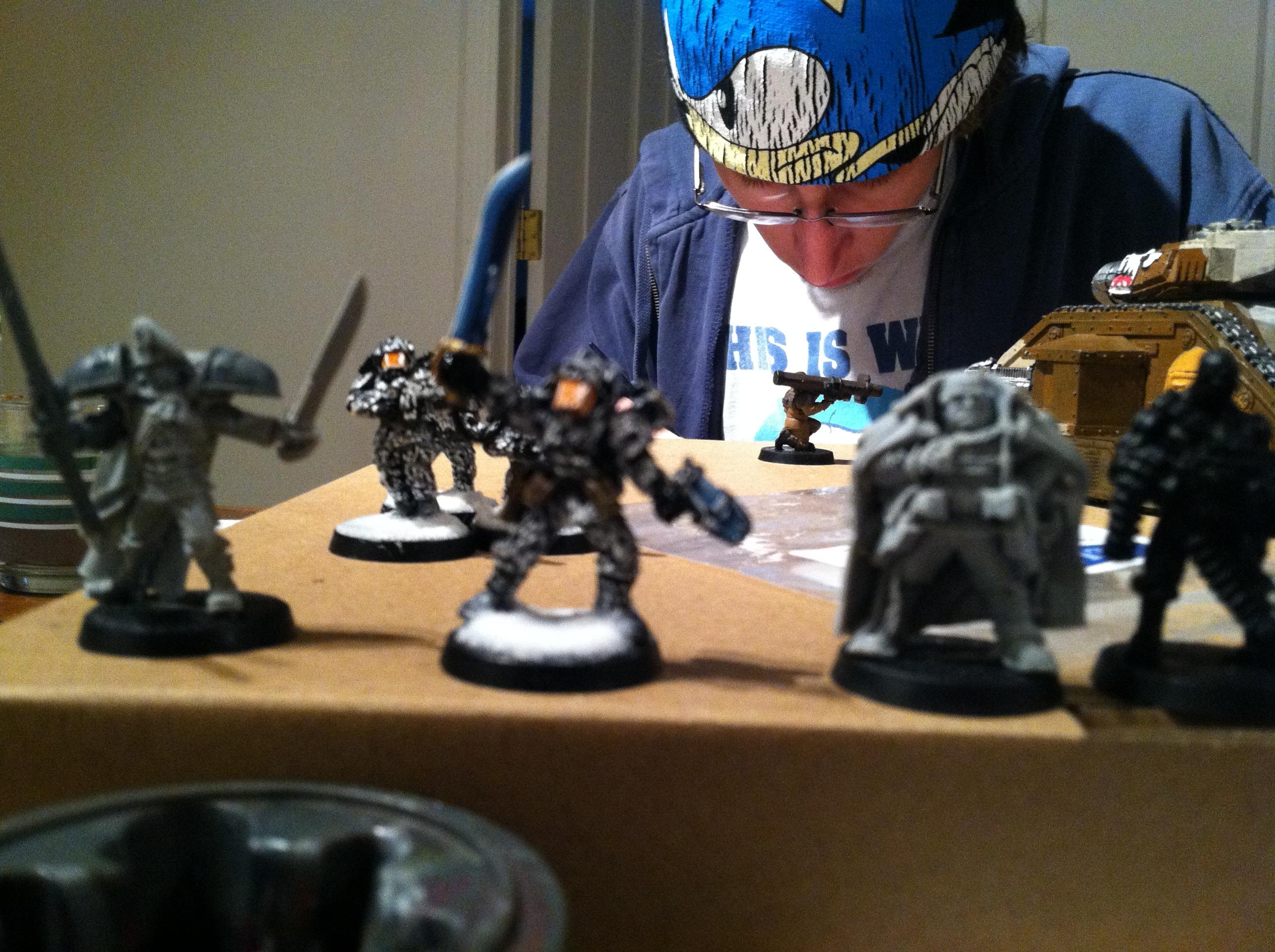 and creed and lord commisar made it in. The commisar came missing his bolter arm! hahah i got to convert let me know what you think of him too guys! Fun side note my buddy is painting guard in this photo and his tank made it in check it out :D