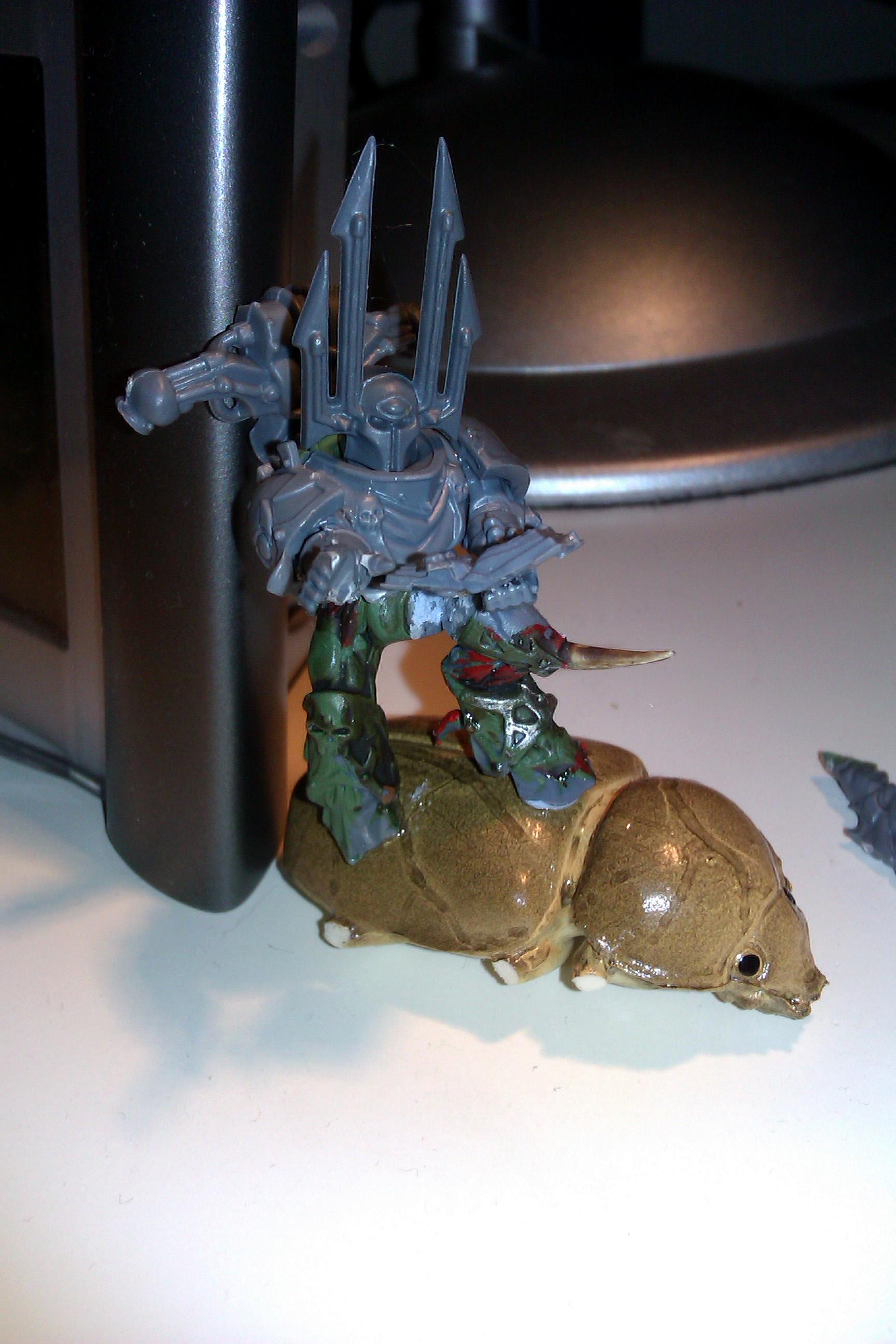 Sorcerer riding a scarab