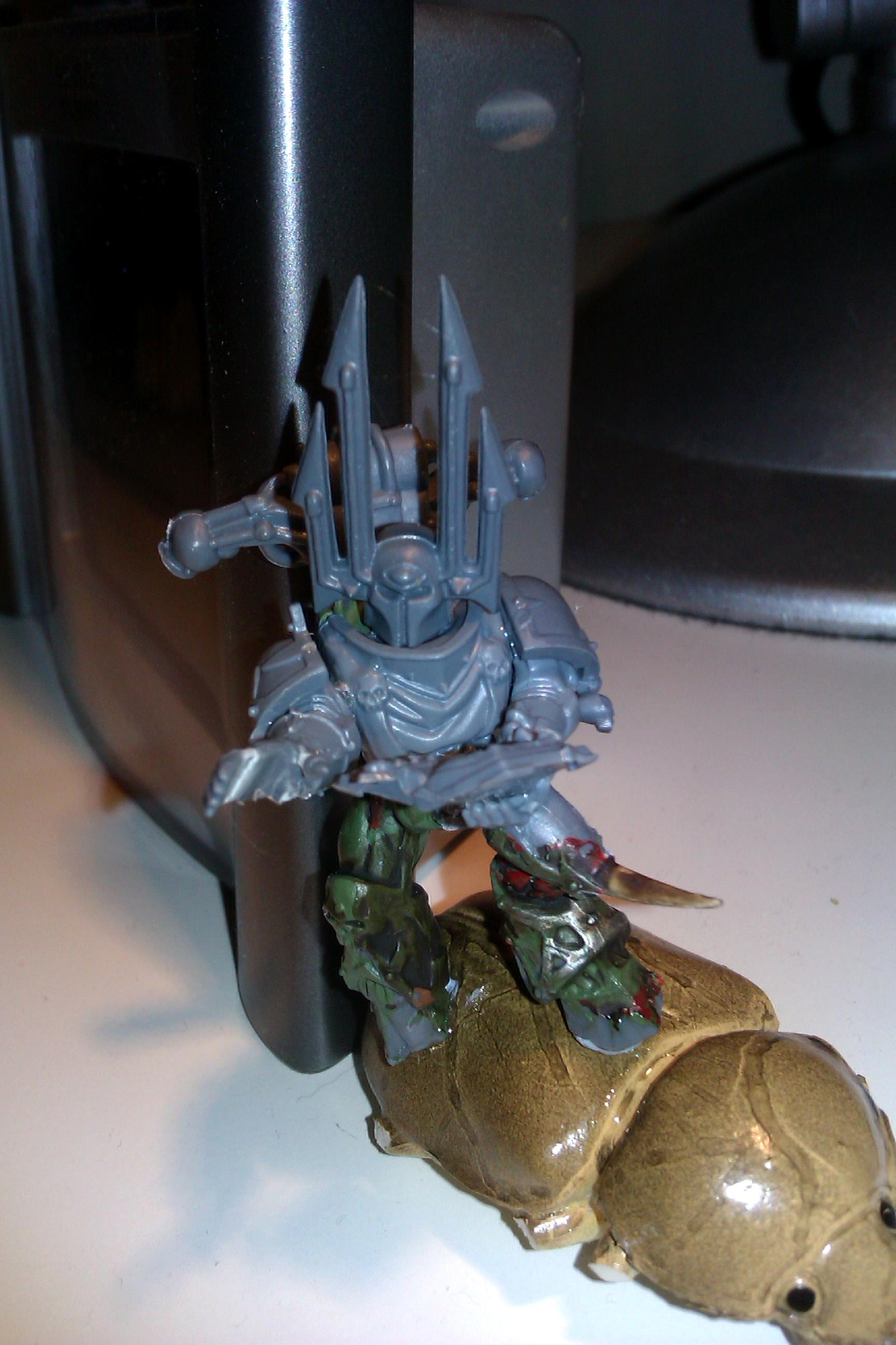 Sorcerer riding a scarab