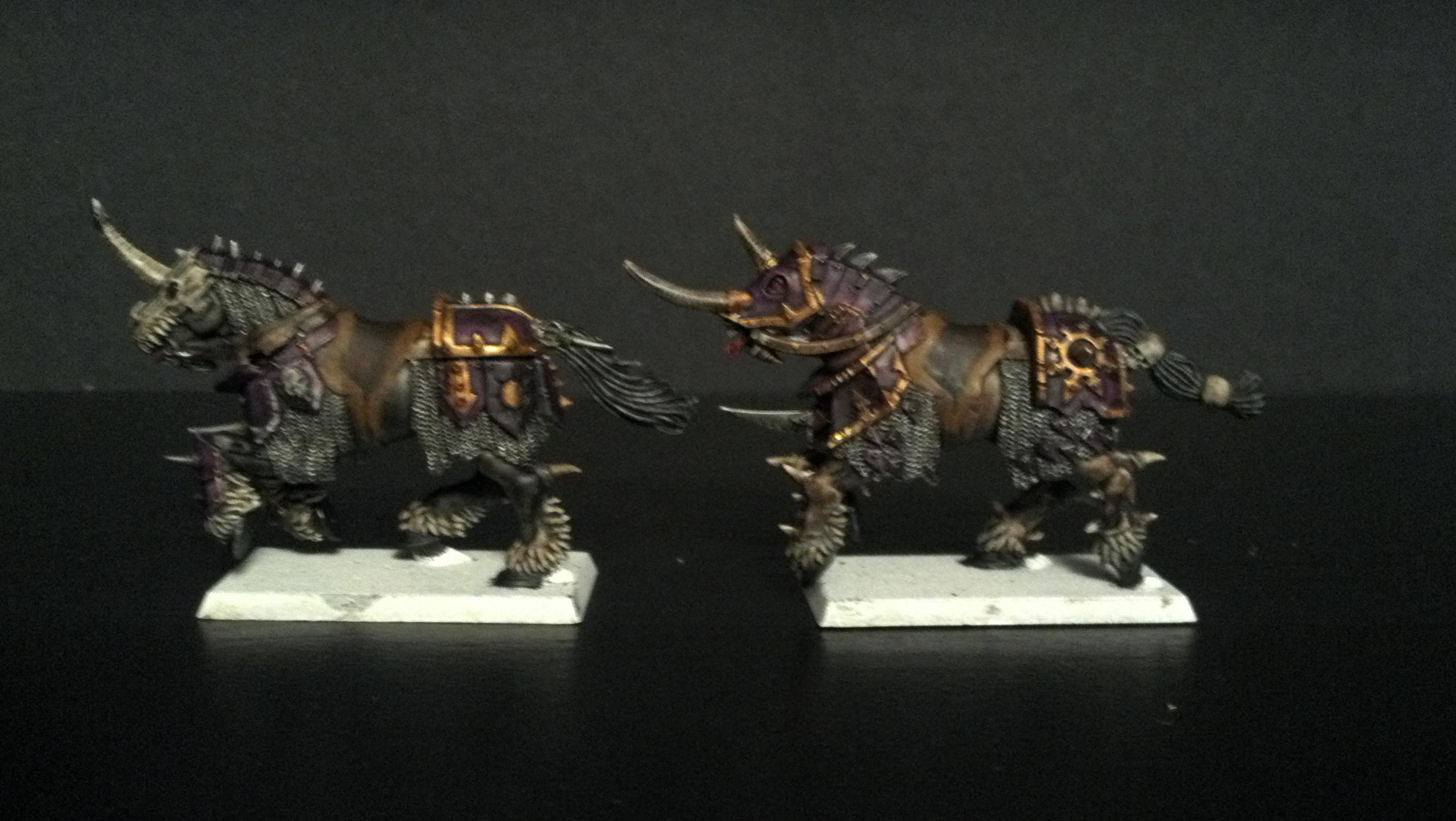 Shot of two finished steeds on their dedicated shelf