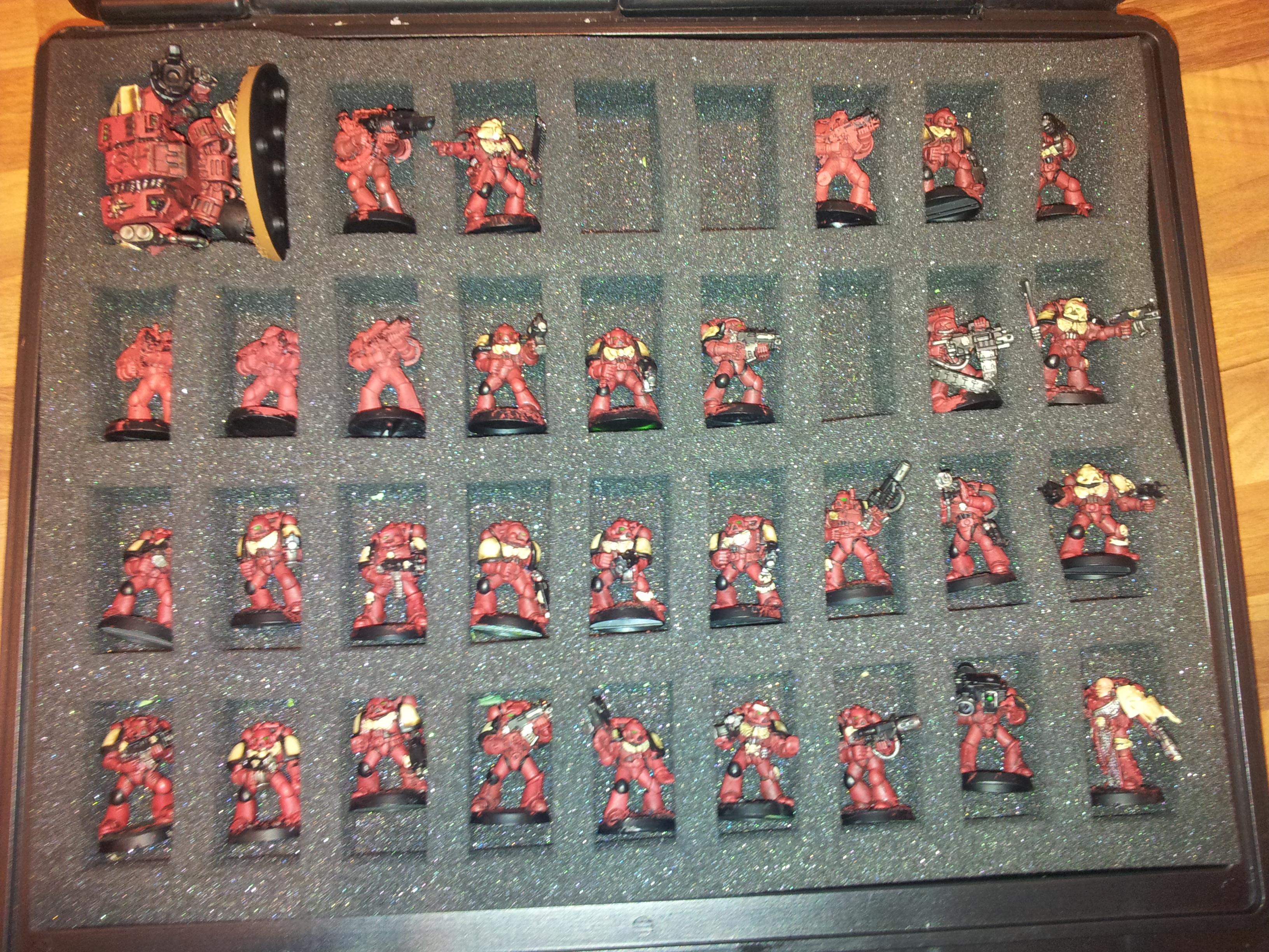 in the box... the space in the big line of tacs is for a flamer guy which ill get when i buy my next t tactical to make my sterngaurd :-) and thats what the 2 on the top are for :-)