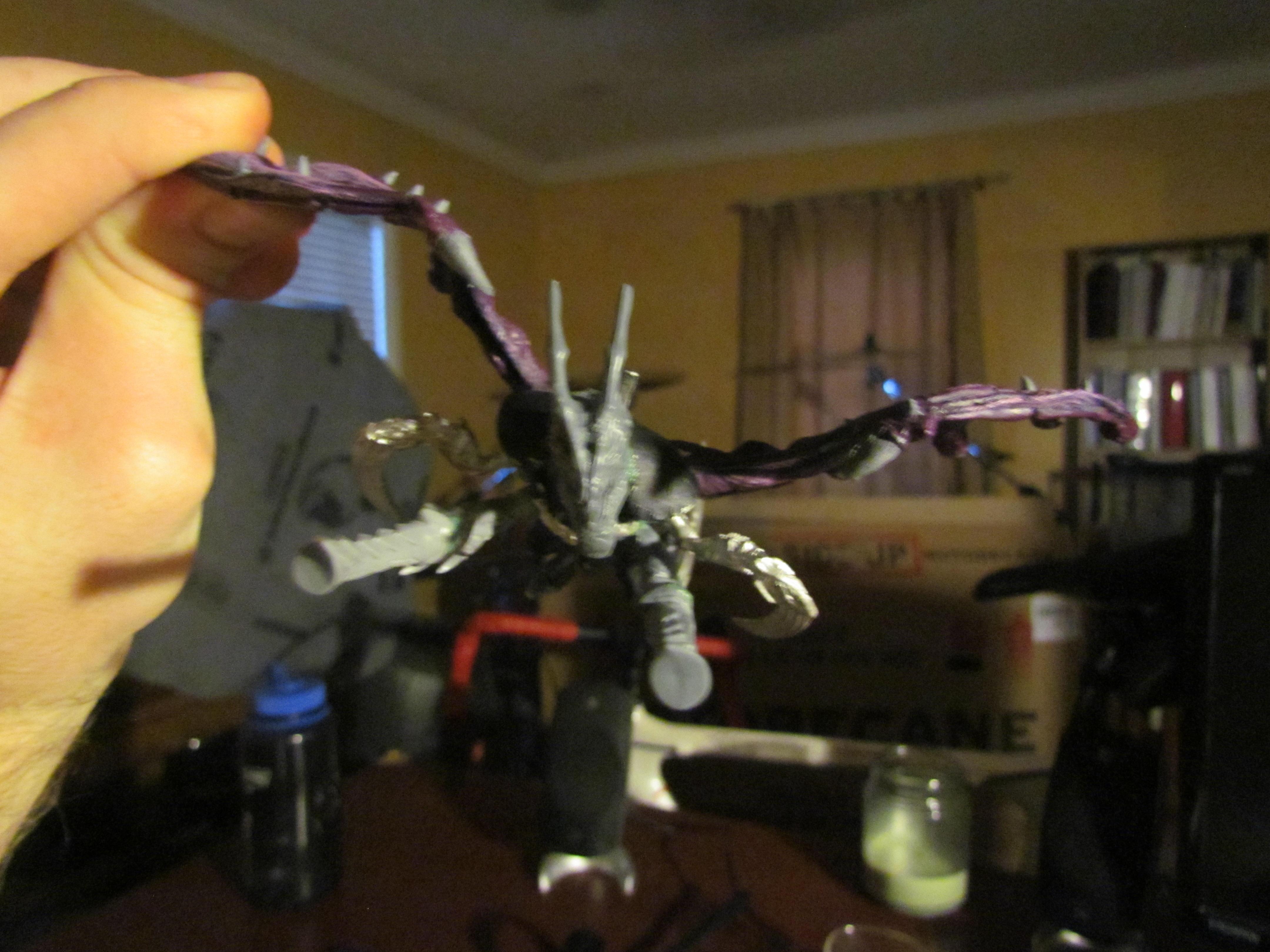 This is about the angle I expect her to be flying...notice the bent wing, that's where the missile will most likely be flying
