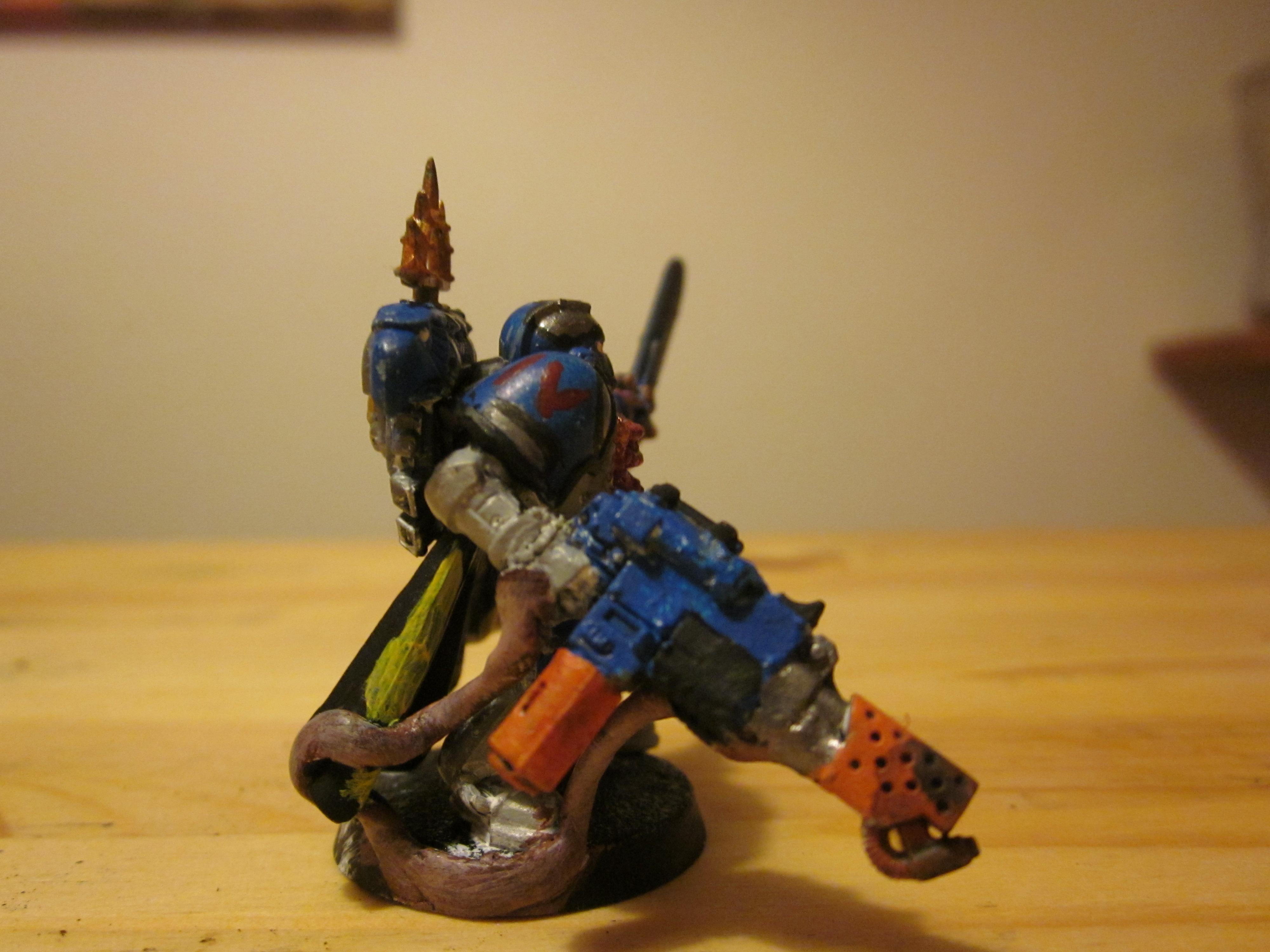 A closeup on the flamer and his right shoulder pad