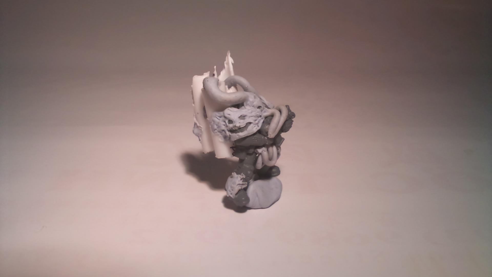 His pauldrons are smiling, it is most amused