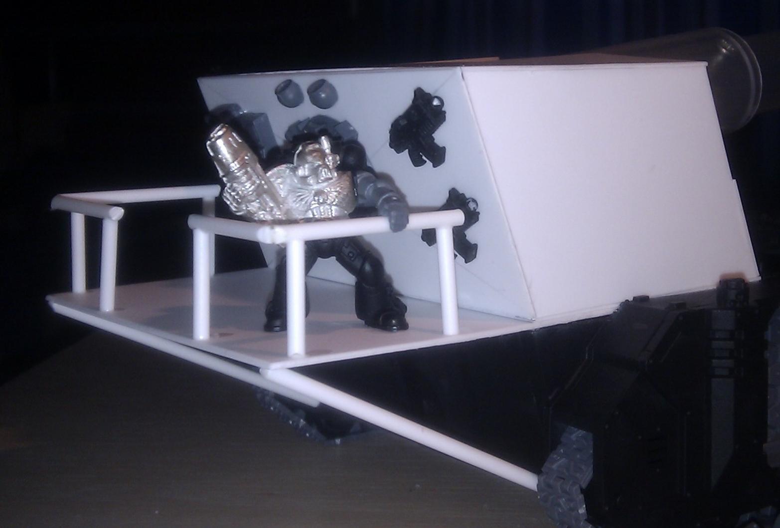 There will be another marine to go on the rear platform soon