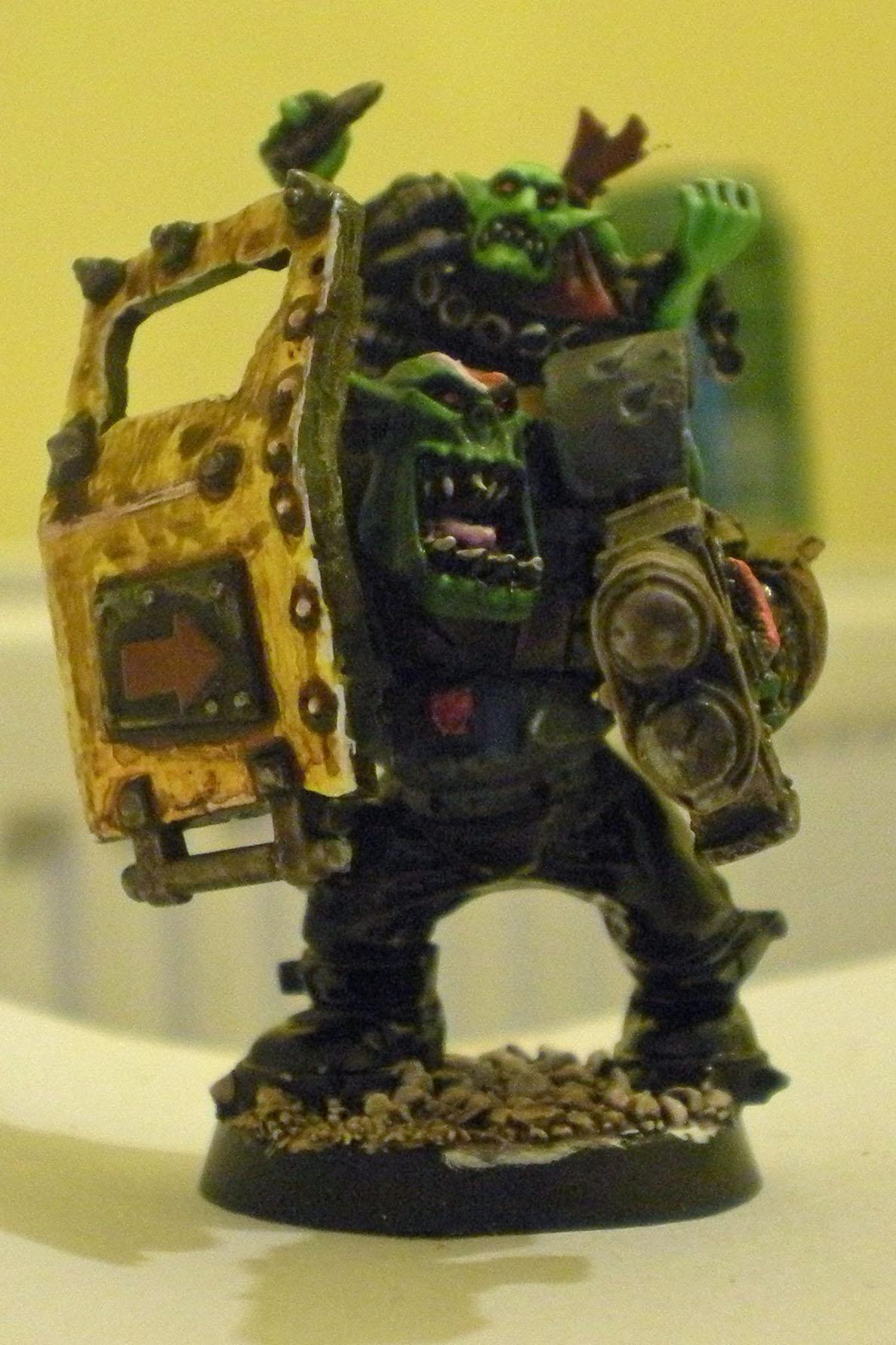Day 6 - Saturday. Fingaz. Will steal anything that isn't welded down. And even some stuff that is. Weilding a "liberated" Bad Moon Trukk fairing, and wearing Black Legion shoulder pads as elbow pads. Second new Nob, really like this kit!