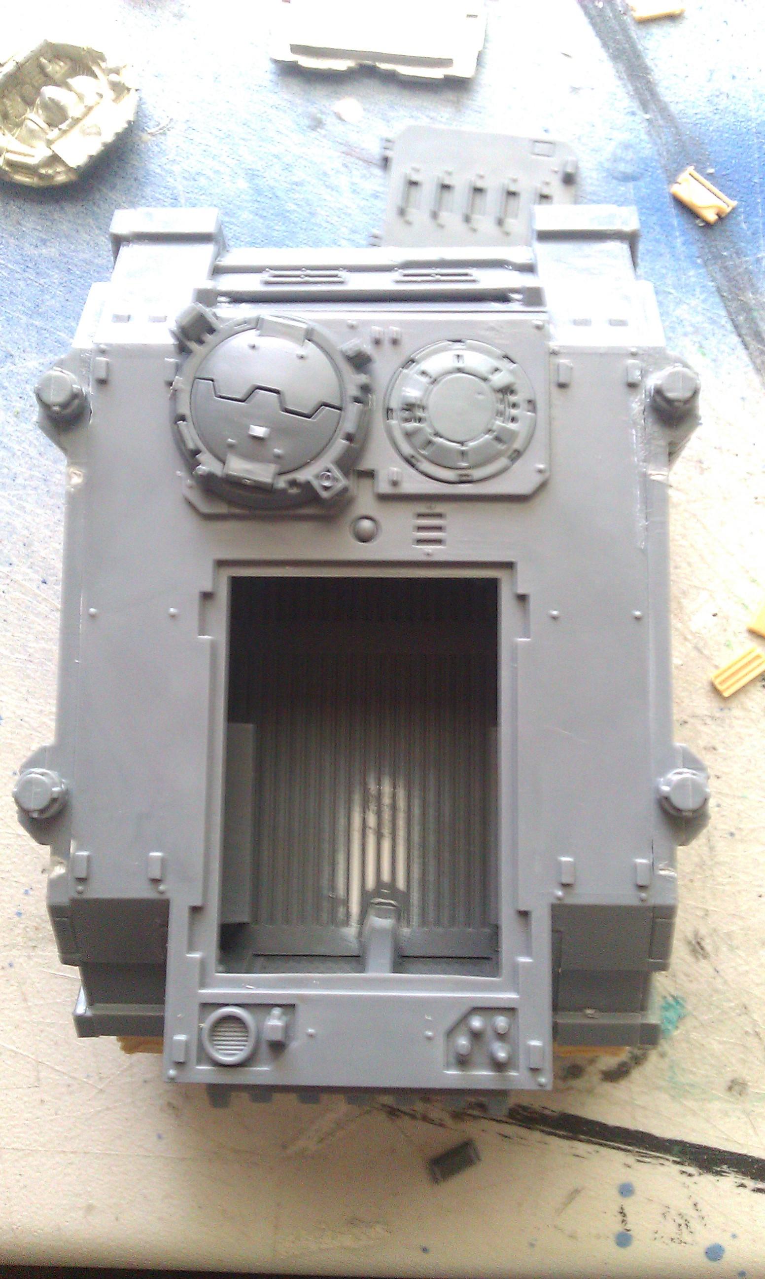 the top is on. i was having trouble with keeping the rear hatch closed so decided to use magnets to hold it closed