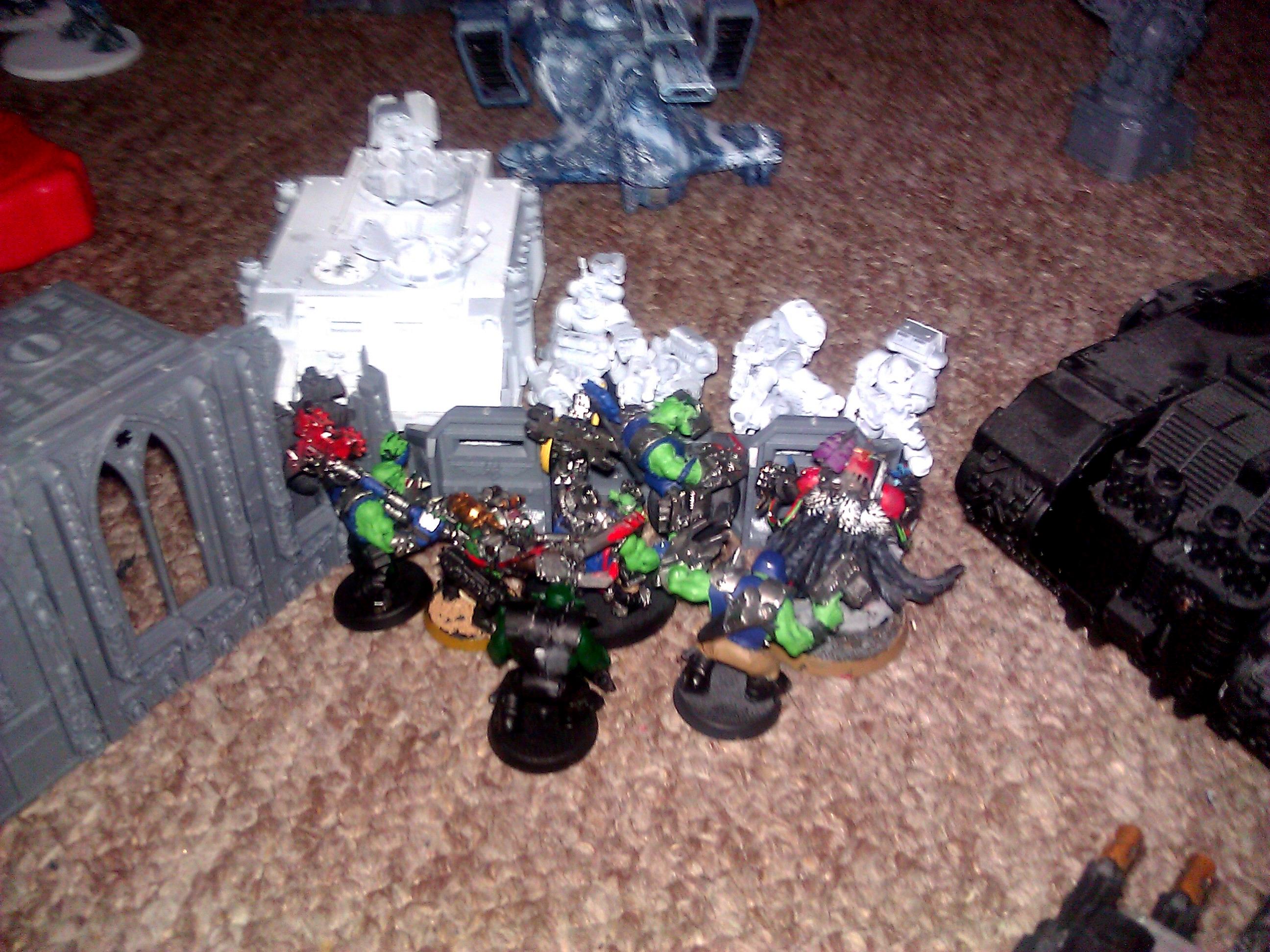 Long Fangs, Nobs and my Chaos Lord fight over the central barricade