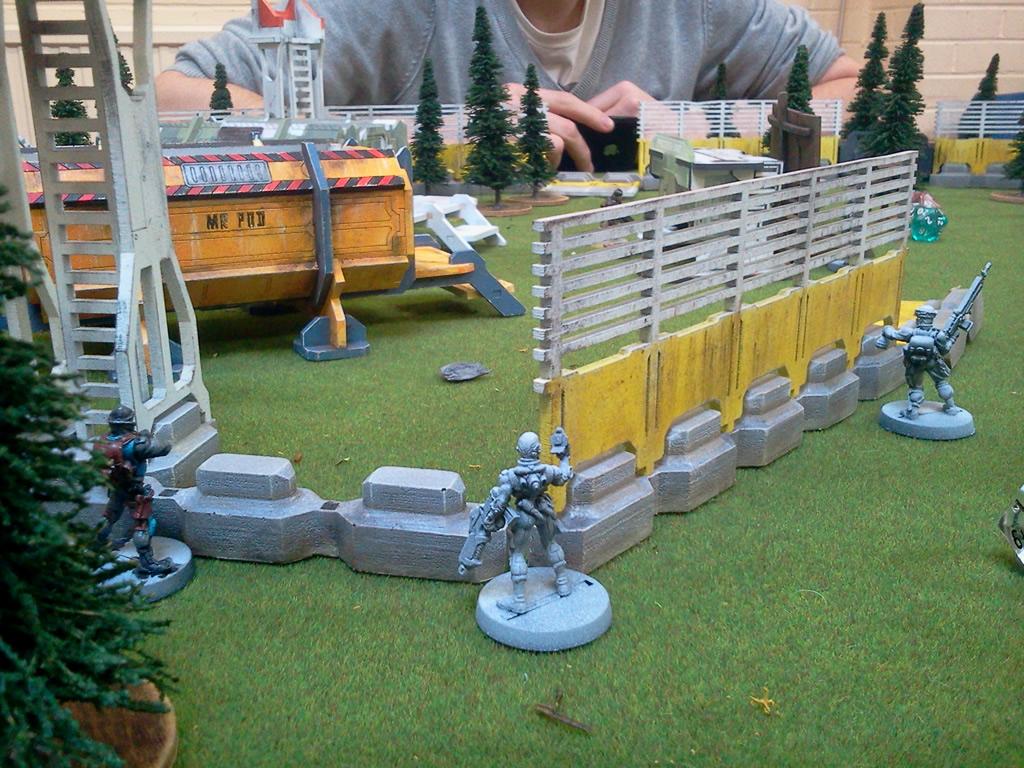 Blowing a hole in the fence to get some flanking fire