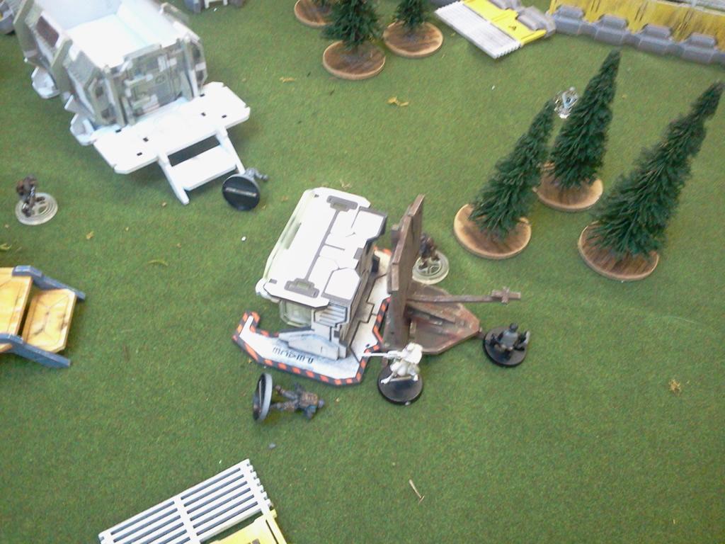 With his comrades in pieces on the floor, the sniper tries to defuse the bomb while the attackers pour shots into him