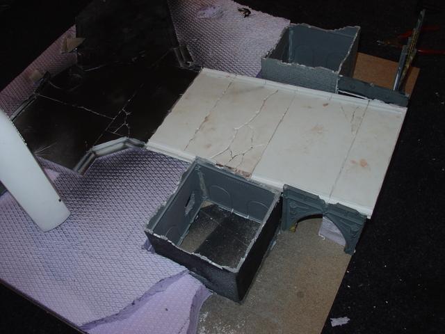 the street is made out of plasticcard, the towers are made out of a WHF caslte and the bridge is made out of 40K Aquila parts