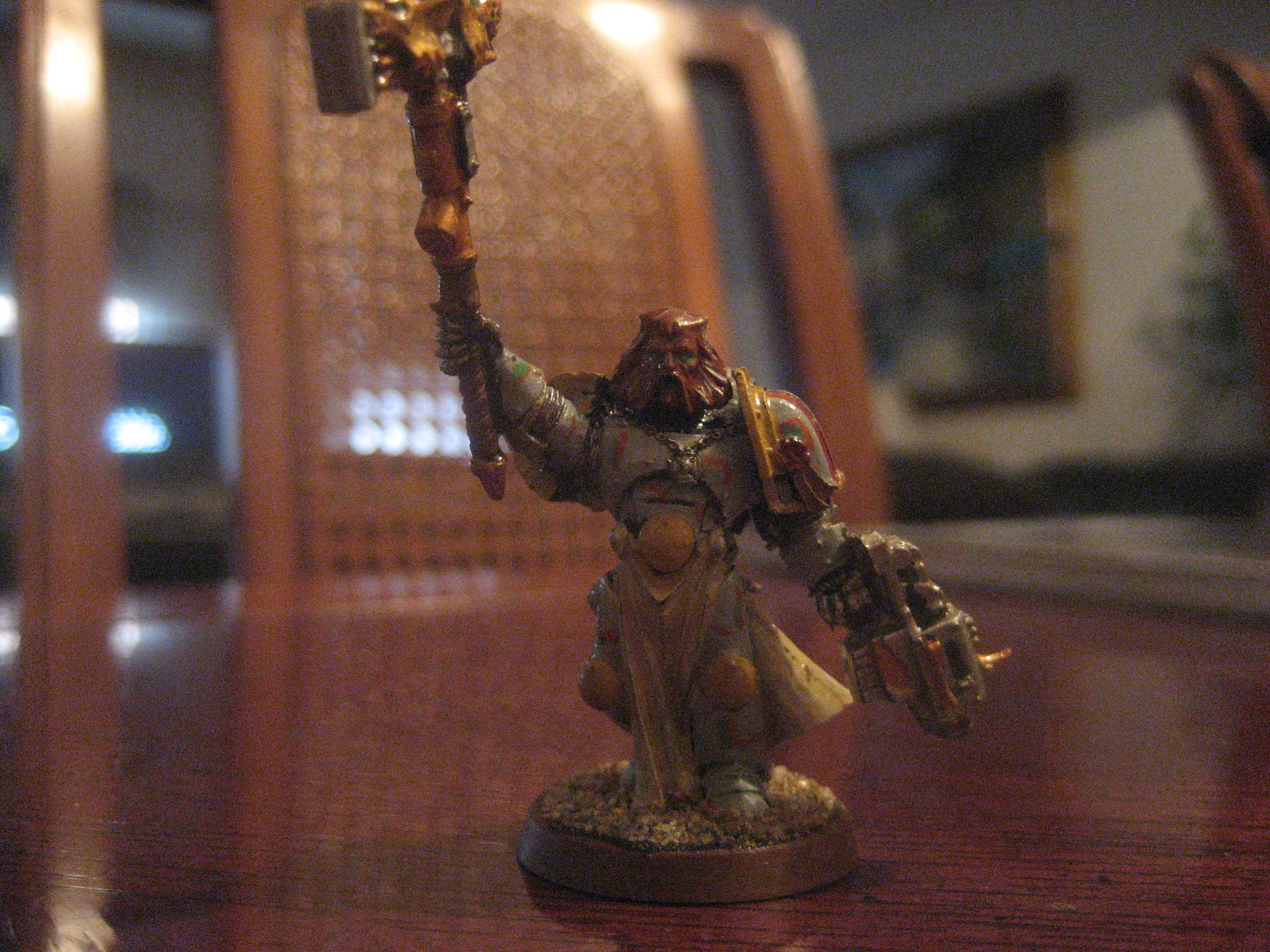 A converted rune priest with ruinic armor