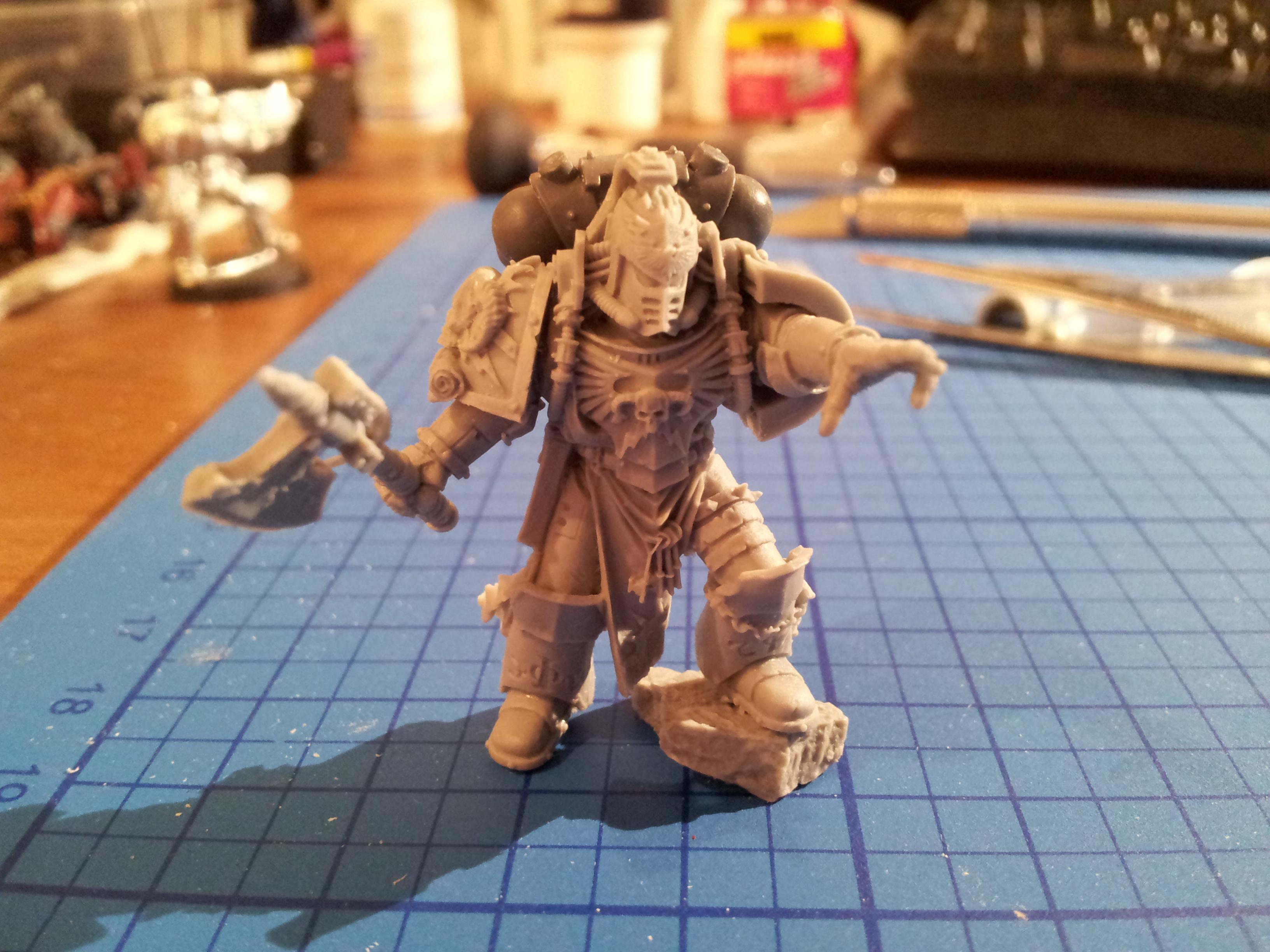 Forgeworld librarian... i gave him a grey knight backpack of which ill show more pictures when i paint him up. 